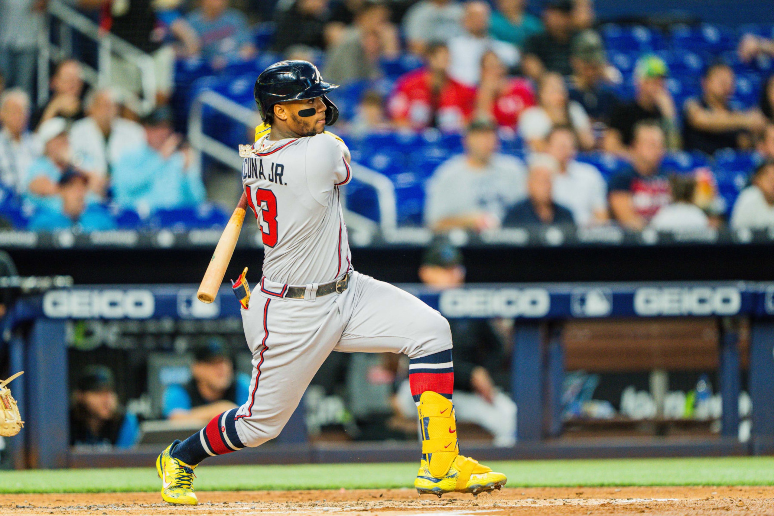 MIAMI, FL - OCTOBER 04: Ronald Acuña Jr. #13 of the Atlanta Braves hits a an RBI single during the second inning against the Miami Marlins at loanDepot park on October 4, 2022 in Miami, Florida. (Photo by Kevin D. Liles/Atlanta Braves/Getty Images)