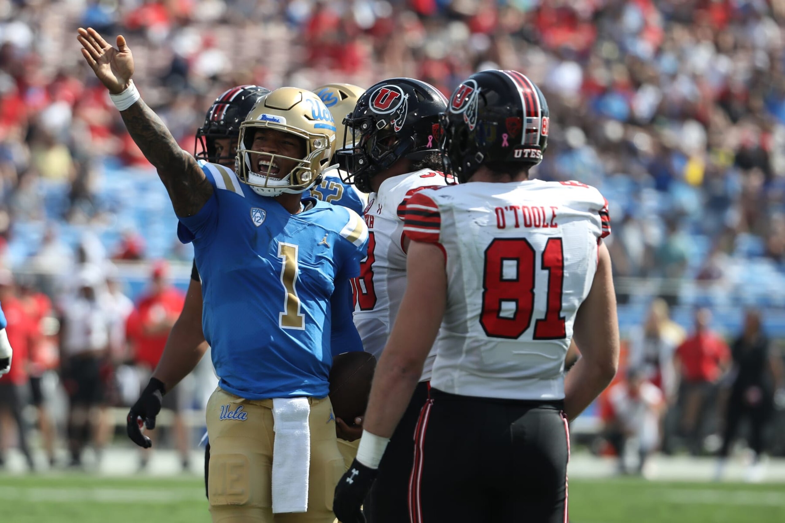 PASADENA, CA - OCTOBER 08: UCLA Bruins quarterback Dorian Thompson-Robinson (1) signals first down during the Utah Utes game versus the UCLA Bruins game on October 8, 2022, at the Rose Bowl in Pasadena, CA. (Photo by Jevone Moore/Icon Sportswire via Getty Images)