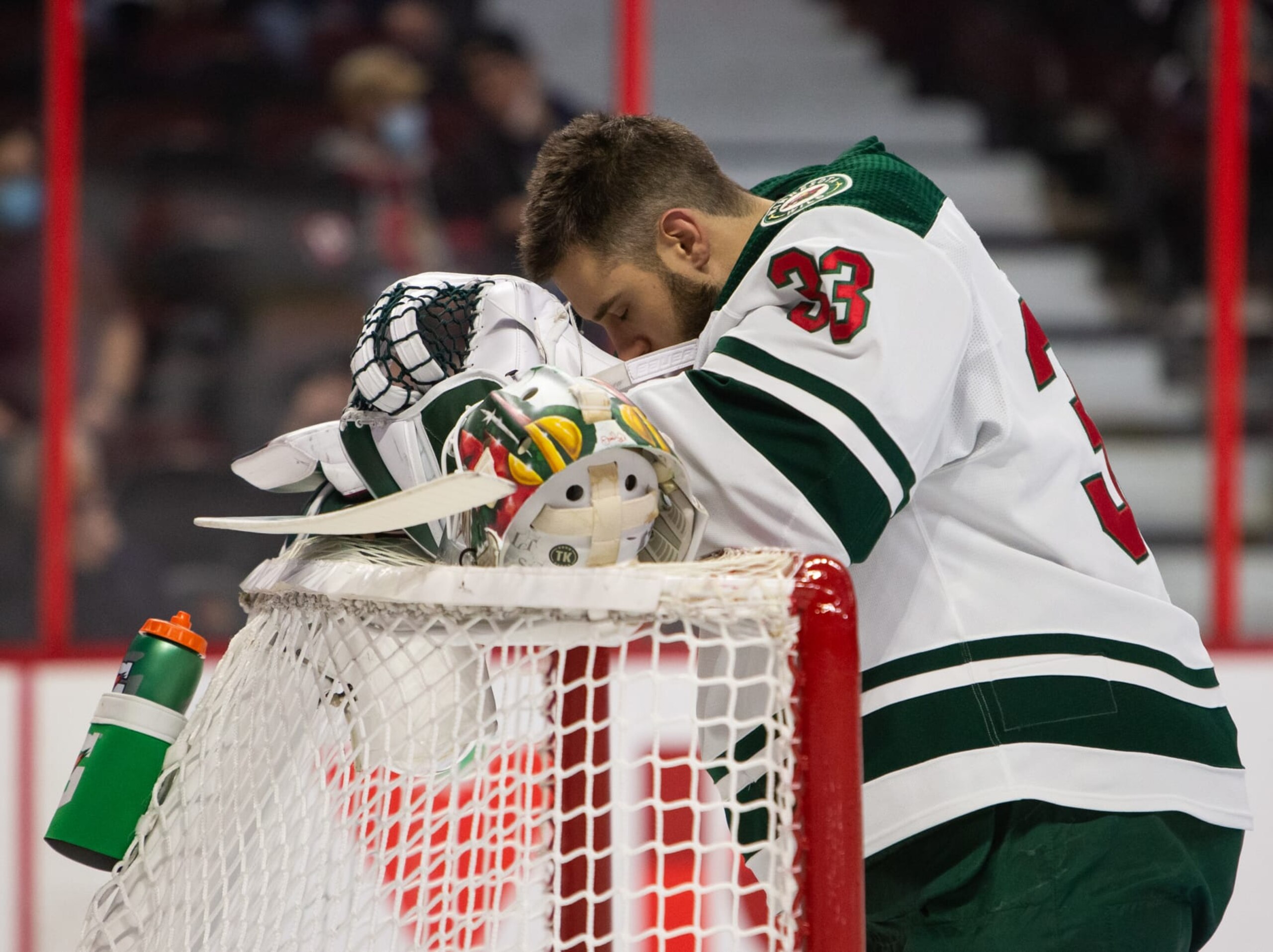 OTTAWA, ON - FEBRUARY 22: Cam Talbot #33 of the Minnesota Wild takes a moment prior to the start of a game against the Ottawa Senators at Canadian Tire Centre on February 22, 2022 in Ottawa, Ontario, Canada. (Photo by Chris Tanouye/NHLI via Getty Images)