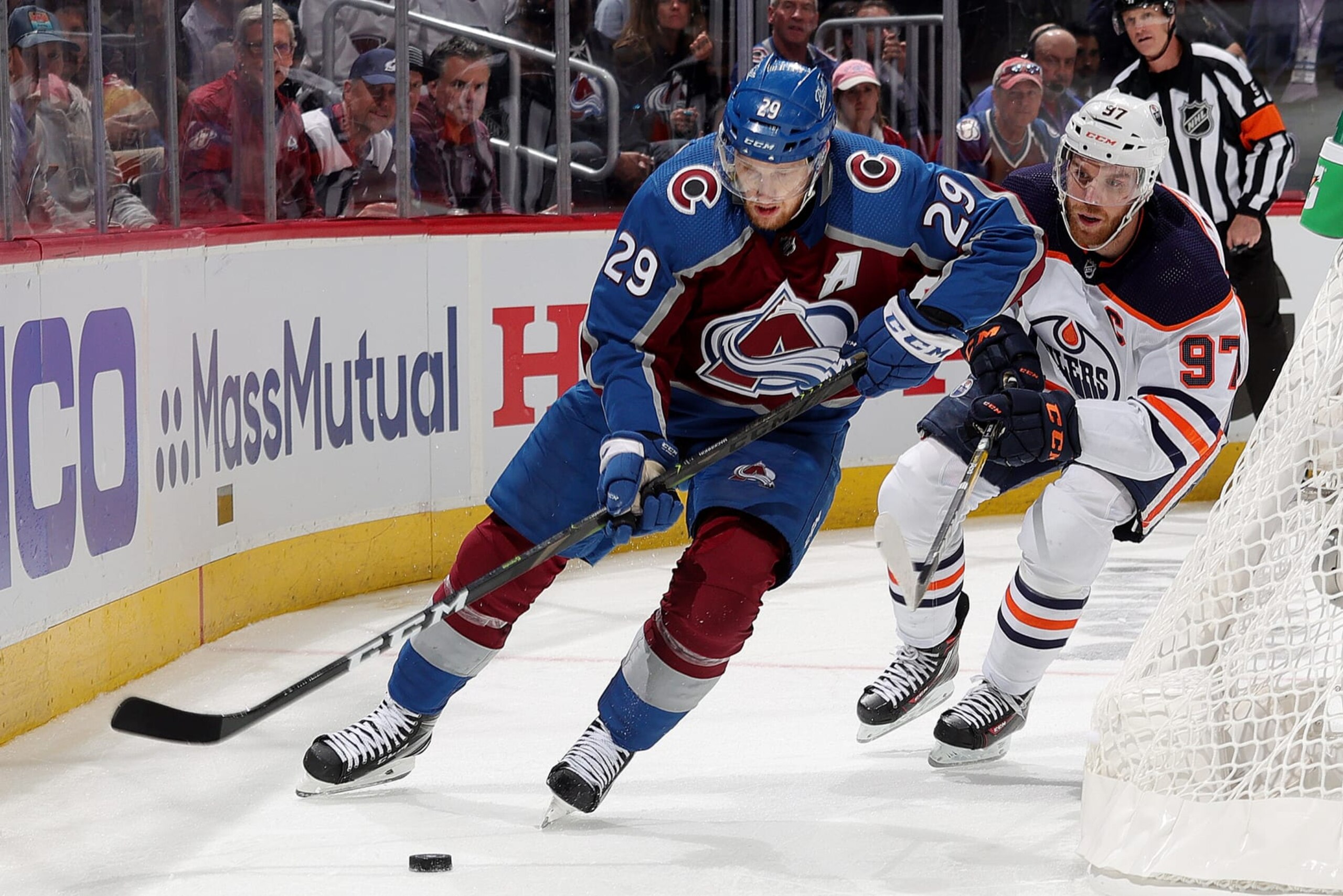 DENVER, COLORADO - JUNE 02: Nathan MacKinnon #29 of the Colorado Avalanche skates against Connor McDavid #97 of the Edmonton Oilers in Game Two of the Western Conference Final of the 2022 Stanley Cup Playoffs at Ball Arena on June 02, 2022 in Denver, Colorado. (Photo by Michael Martin/NHLI via Getty Images)
