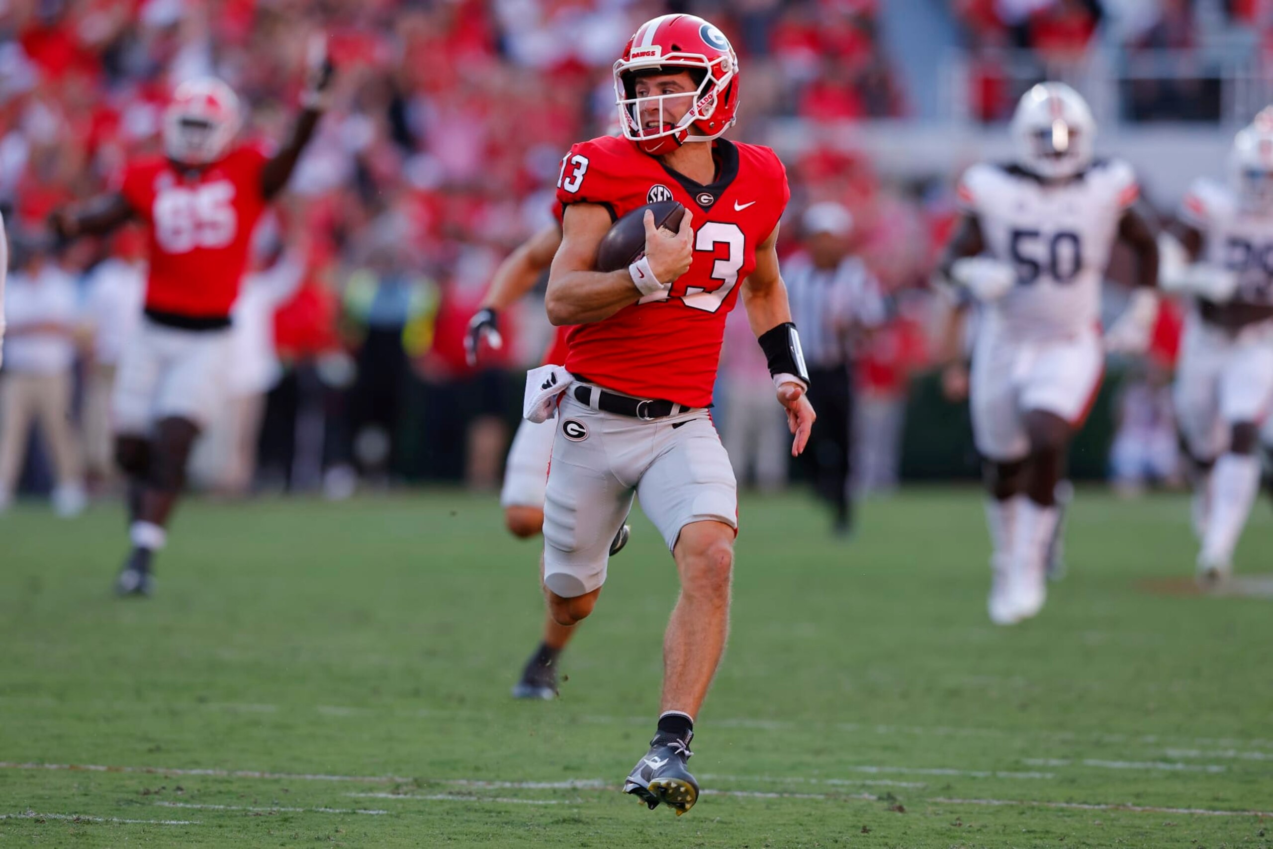 ATHENS, GA - OCTOBER 08: Stetson Bennett #13 of the Georgia Bulldogs rushes in for a touchdown in the second half against the Auburn Tigers at Sanford Stadium on October 8, 2022 in Athens, Georgia. (Photo by Todd Kirkland/Getty Images)