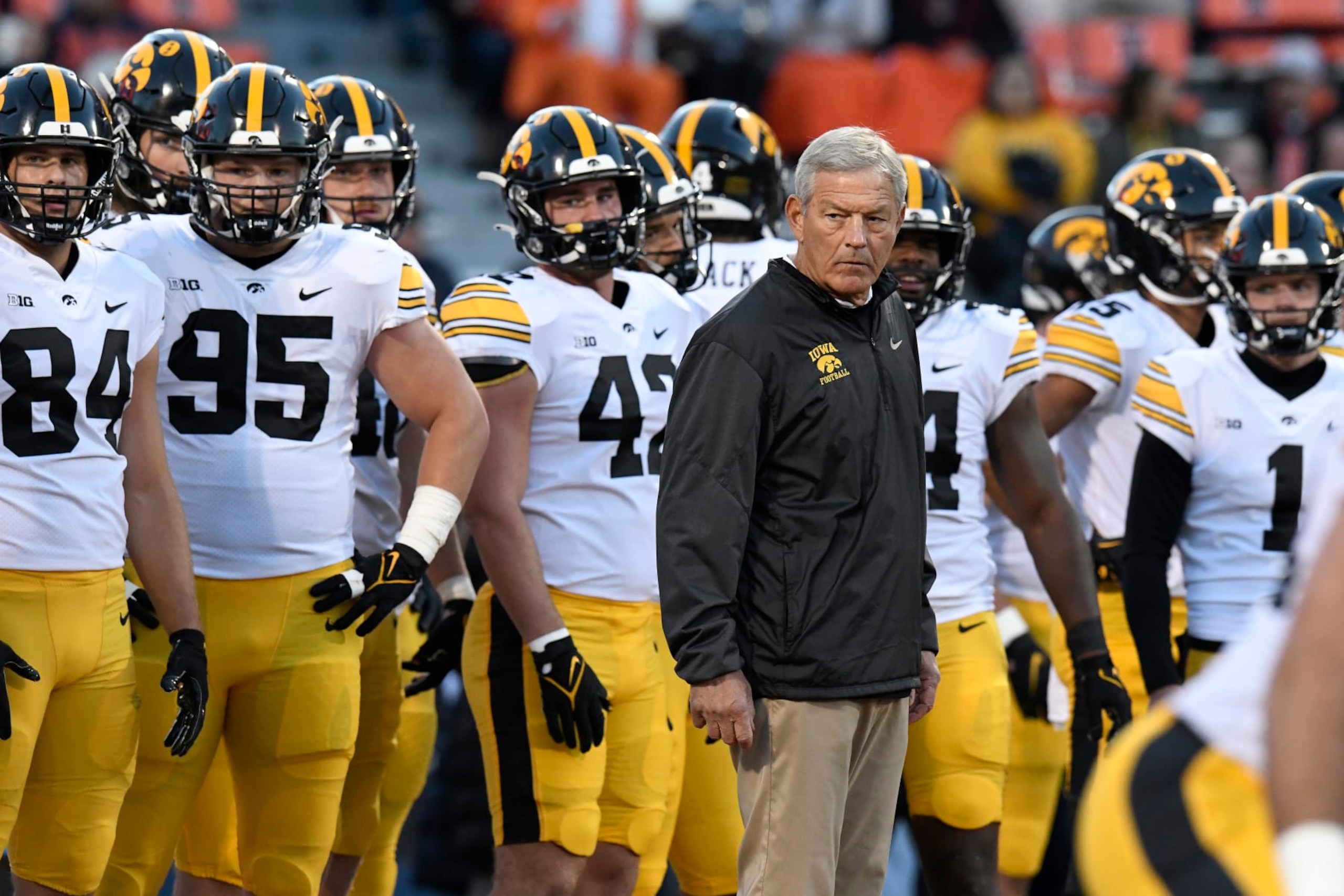 CHAMPAIGN, IL - OCTOBER 08: Iowa Hawkeyes head coach Kirk Ferentz looks on as players warm up for the college football game between the Iowa Hawkeyes and the Illinois Fighting Illini on October 7, 2022, at Memorial Stadium in Champaign, Illinois. (Photo by Michael Allio/Icon Sportswire via Getty Images)