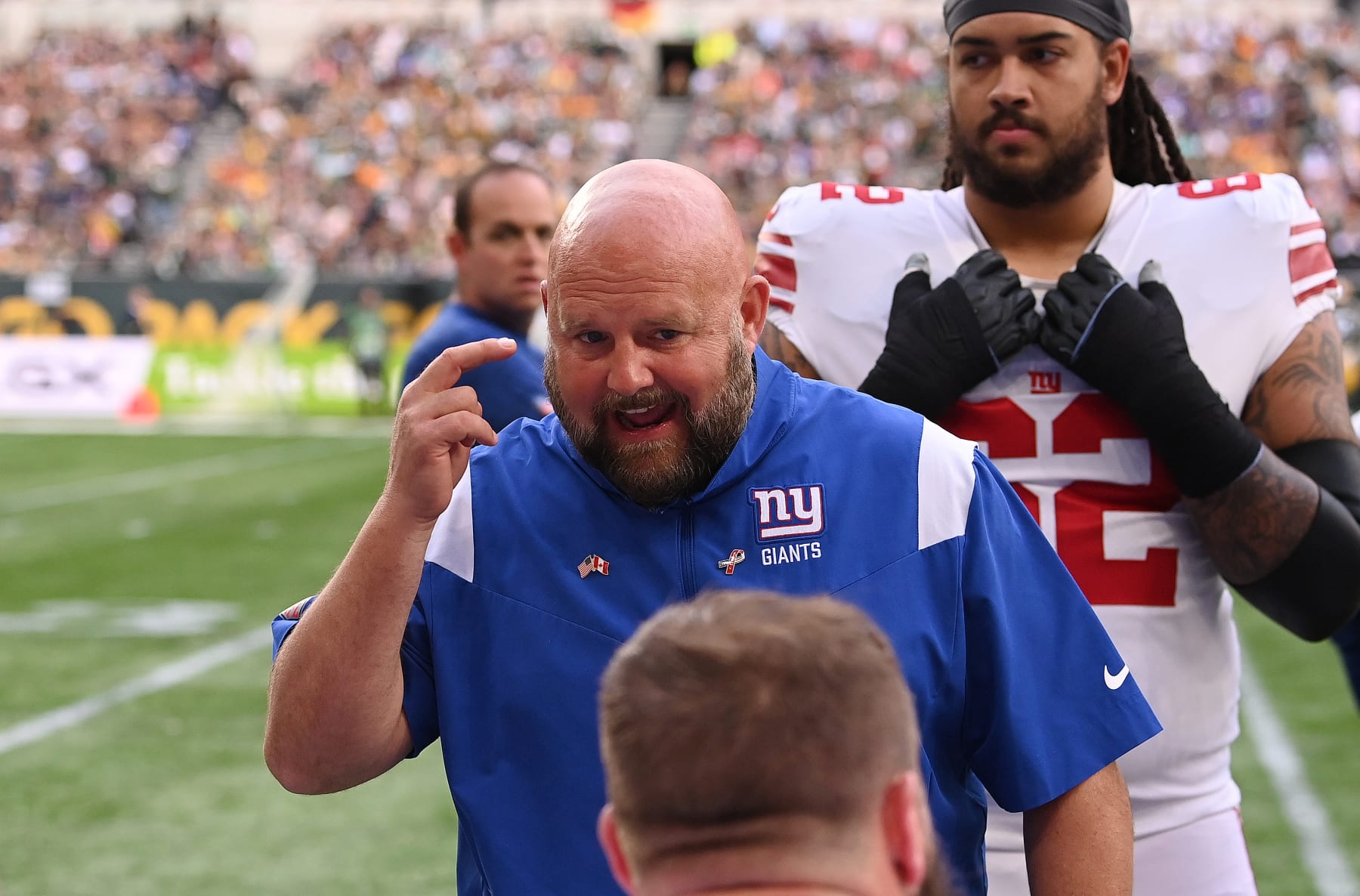 LONDON, ENGLAND - OCTOBER 09: Brian Daboll, Head Coach of the New York Giants gives their team instructions in the second half during the NFL match between New York Giants and Green Bay Packers at Tottenham Hotspur Stadium on October 09, 2022 in London, England. (Photo by Stu Forster/Getty Images)