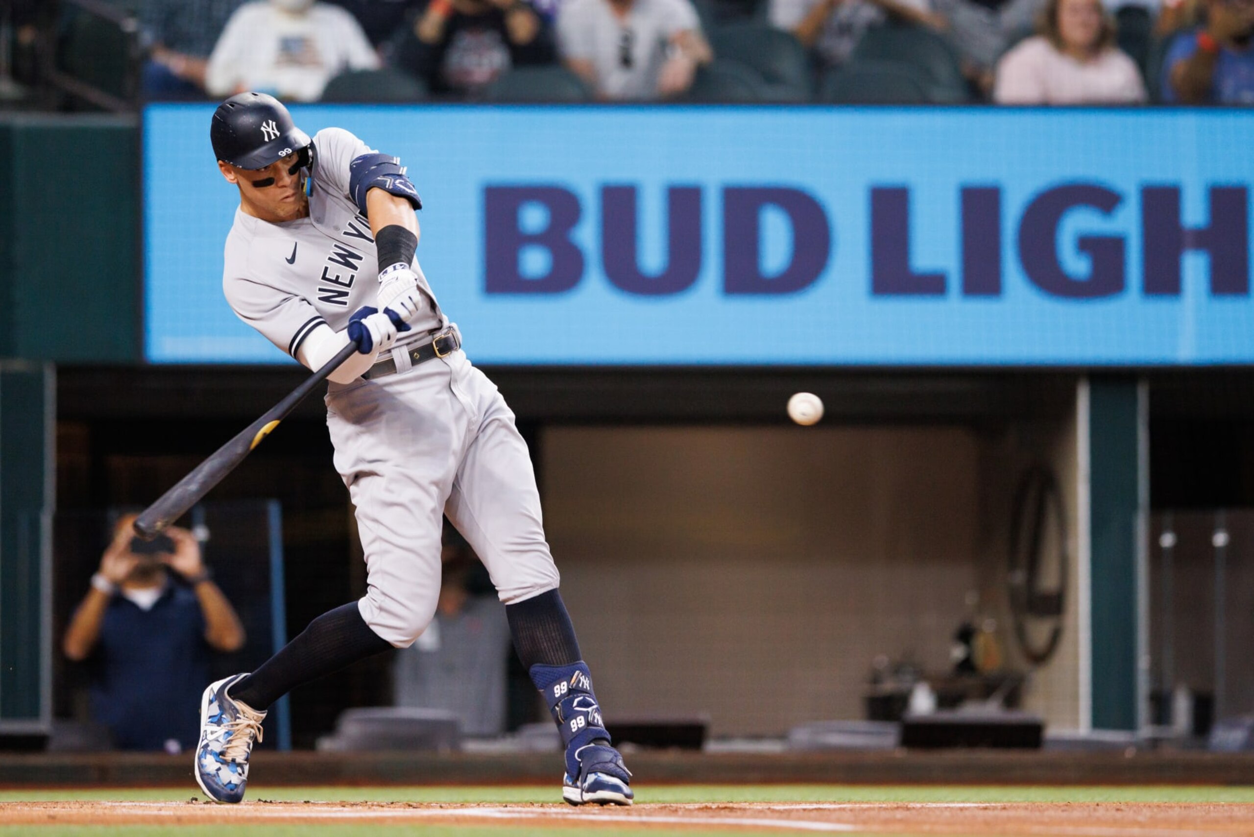 ARLINGTON, TX - OCTOBER 04: Aaron Judge #99 of the New York Yankees hits his 62nd home run of the season against the Texas Rangers during the first inning in game two of a double header at Globe Life Field on October 4, 2022 in Arlington, Texas. (Photo by Bailey Orr/Texas Rangers/Getty Images) ARLINGTON, TX - OCTOBER 04: Aaron Judge #99 of the New York Yankees hits his 62nd home run of the season against the Texas Rangers during the first inning in game two of a double header at Globe Life Field on October 4, 2022 in Arlington, Texas. (Photo by Bailey Orr/Texas Rangers/Getty Images)