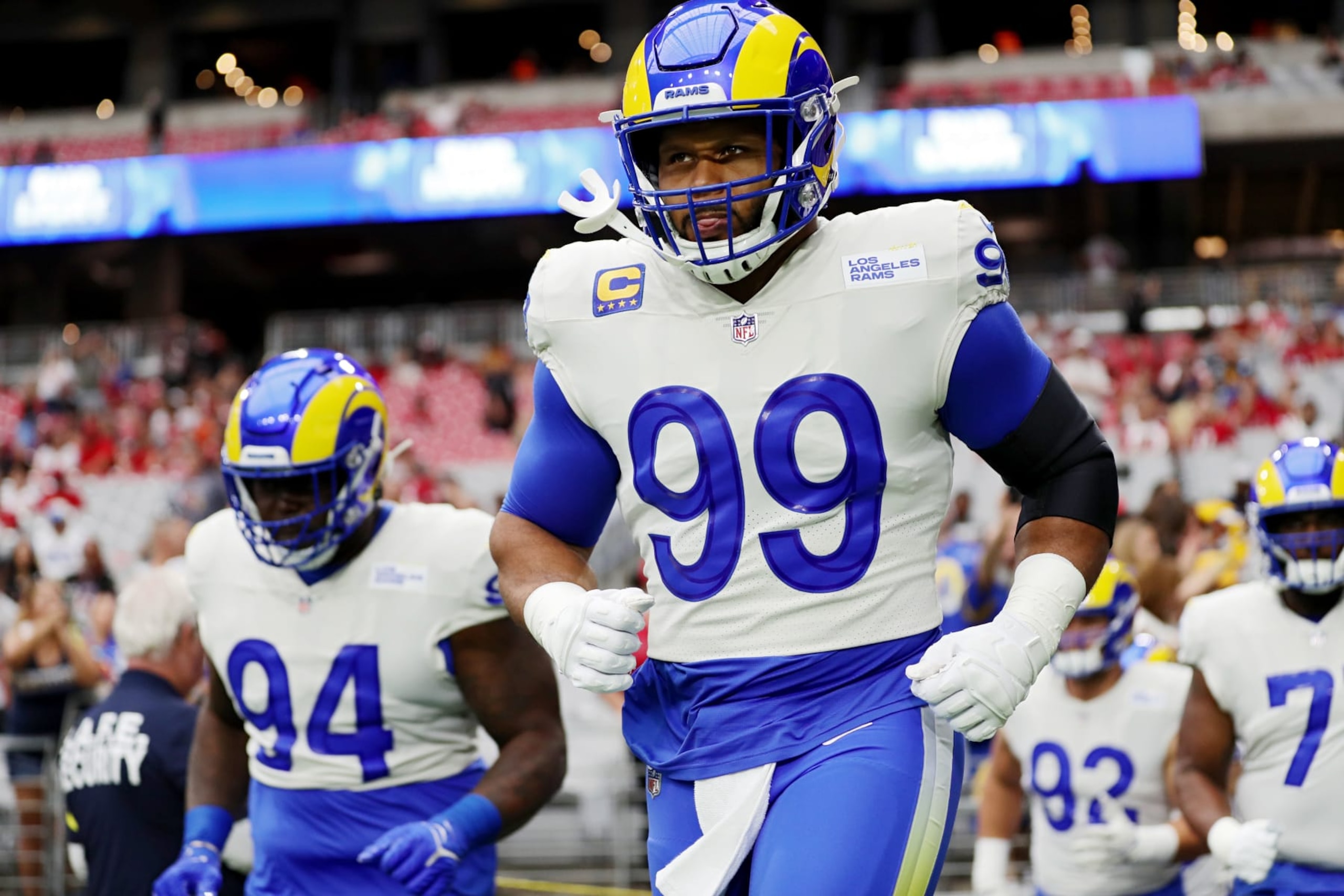 GLENDALE, ARIZONA - SEPTEMBER 25: Defensive tackle Aaron Donald #99 of the Los Angeles Rams runs onto the field before the game against the Los Angeles Rams at State Farm Stadium on September 25, 2022 in Glendale, Arizona. (Photo by Mike Christy/Getty Images)
