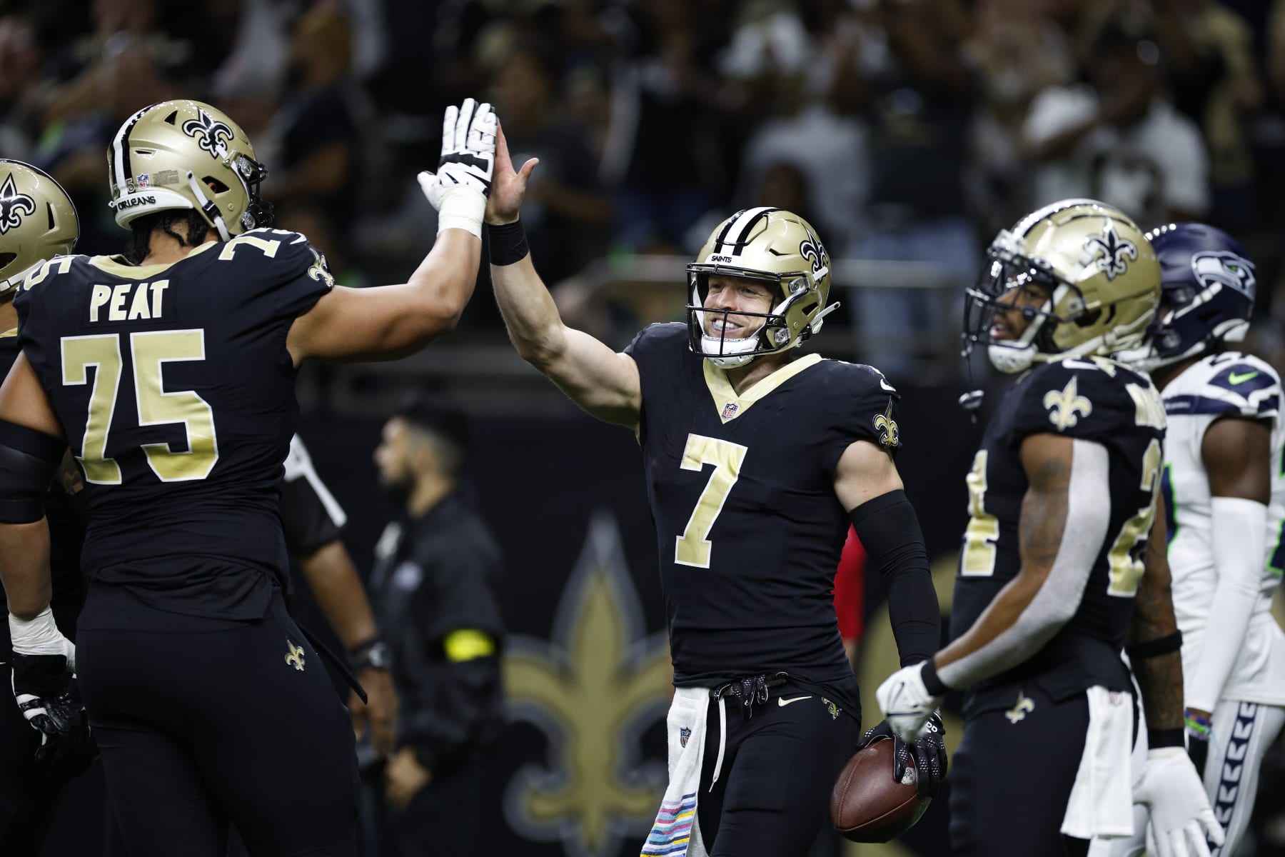 NEW ORLEANS, LOUISIANA - OCTOBER 09: Taysom Hill #7 of the New Orleans Saints reacts after scoring a touchdown in the second quarter of the game against the Seattle Seahawks at Caesars Superdome on October 09, 2022 in New Orleans, Louisiana. (Photo by Chris Graythen/Getty Images)