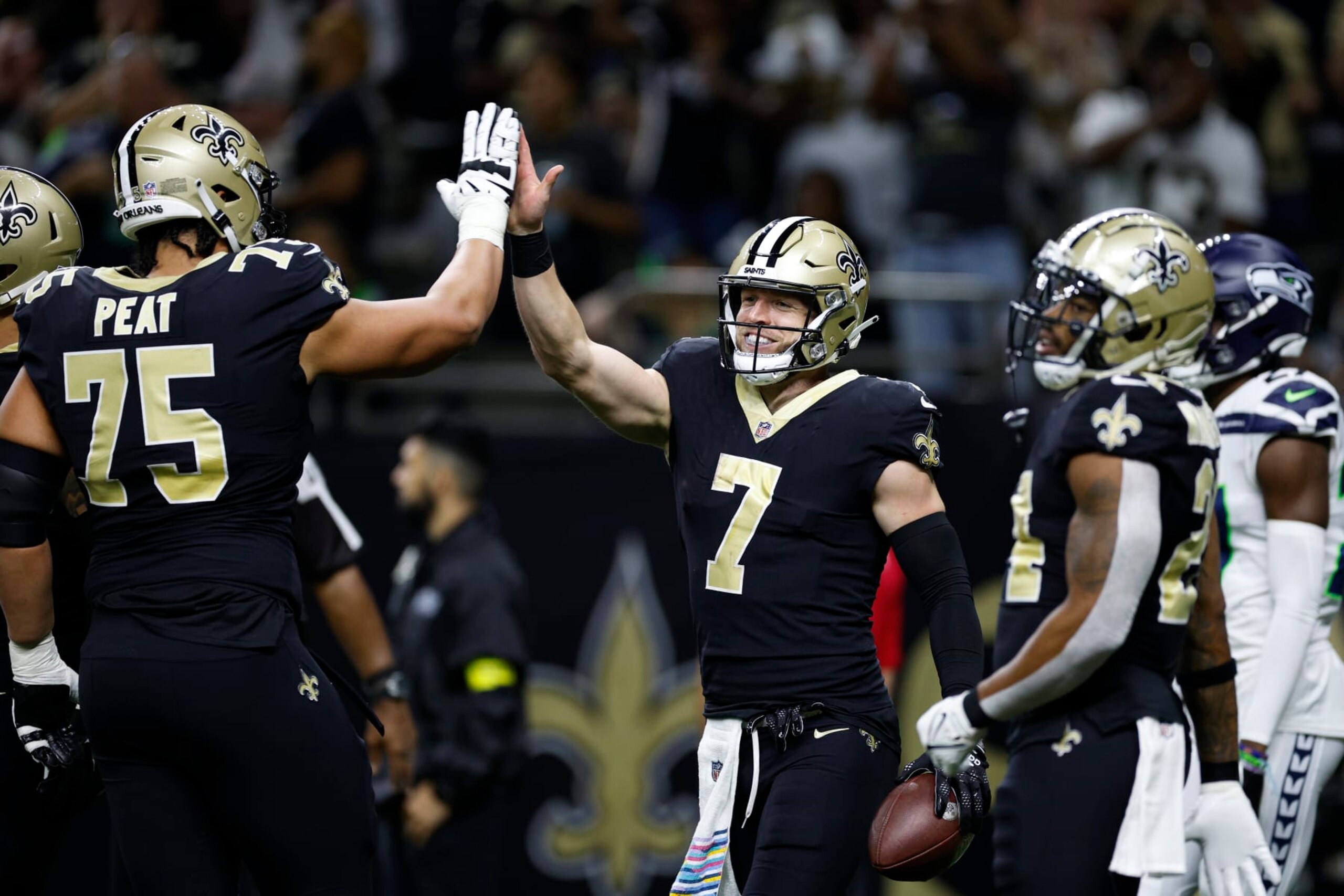 NEW ORLEANS, LOUISIANA - OCTOBER 09: Taysom Hill #7 of the New Orleans Saints reacts after scoring a touchdown in the second quarter of the game against the Seattle Seahawks at Caesars Superdome on October 09, 2022 in New Orleans, Louisiana. (Photo by Chris Graythen/Getty Images)