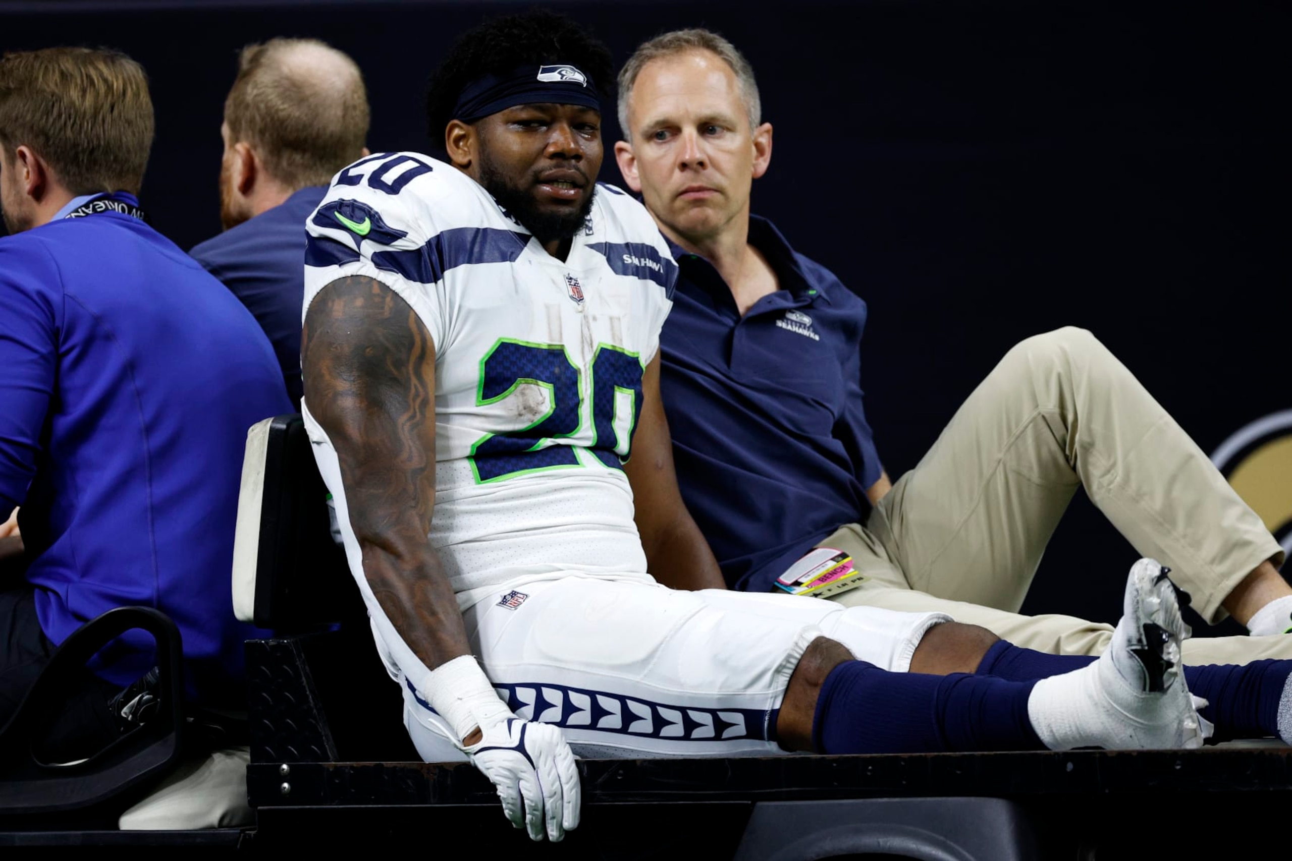 NEW ORLEANS, LOUISIANA - OCTOBER 09: Rashaad Penny #20 of the Seattle Seahawks is carted off the field after being injured during the third quarter against the New Orleans Saints at Caesars Superdome on October 09, 2022 in New Orleans, Louisiana. (Photo by Chris Graythen/Getty Images) NEW ORLEANS, LOUISIANA - OCTOBER 09: Rashaad Penny #20 of the Seattle Seahawks is carted off the field after being injured during the third quarter against the New Orleans Saints at Caesars Superdome on October 09, 2022 in New Orleans, Louisiana. (Photo by Chris Graythen/Getty Images)