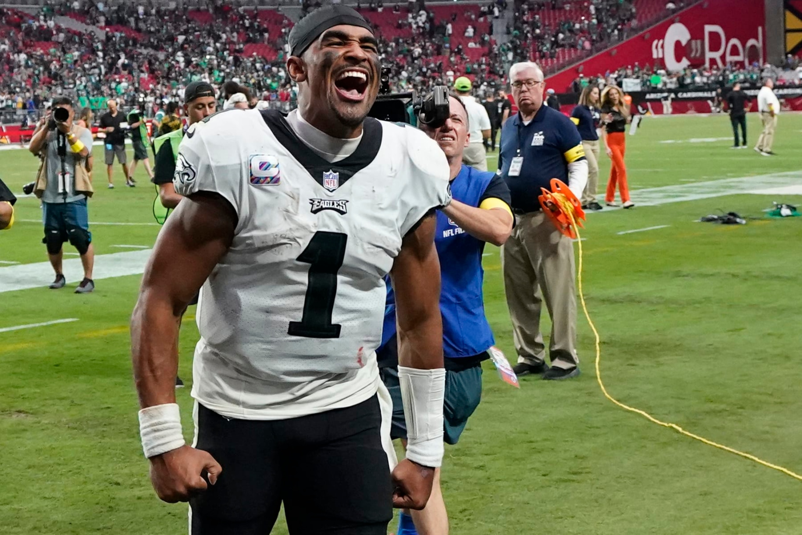 Philadelphia Eagles quarterback Jalen Hurts (1) celebrates after defeating the Arizona Cardinals in an NFL football game, Sunday, Oct. 9, 2022, in Glendale, Ariz. (AP Photo/Ross D. Franklin) Philadelphia Eagles quarterback Jalen Hurts (1) celebrates after defeating the Arizona Cardinals in an NFL football game, Sunday, Oct. 9, 2022, in Glendale, Ariz. (AP Photo/Ross D. Franklin)