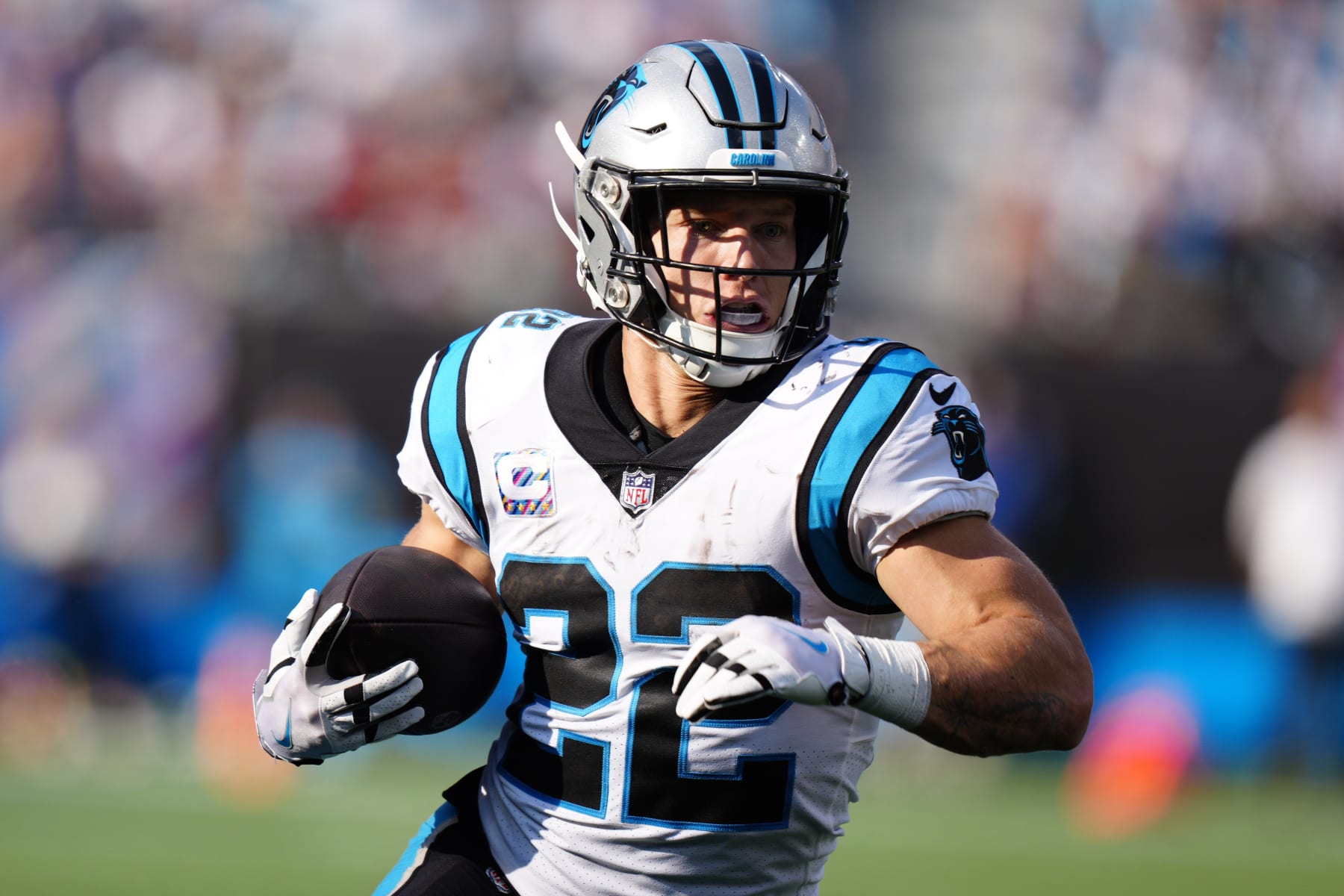 Carolina Panthers running back Christian McCaffrey runs against the San Francisco 49ers during the first half an NFL football game on Sunday, Oct. 9, 2022, in Charlotte, N.C. (AP Photo/Jacob Kupferman)