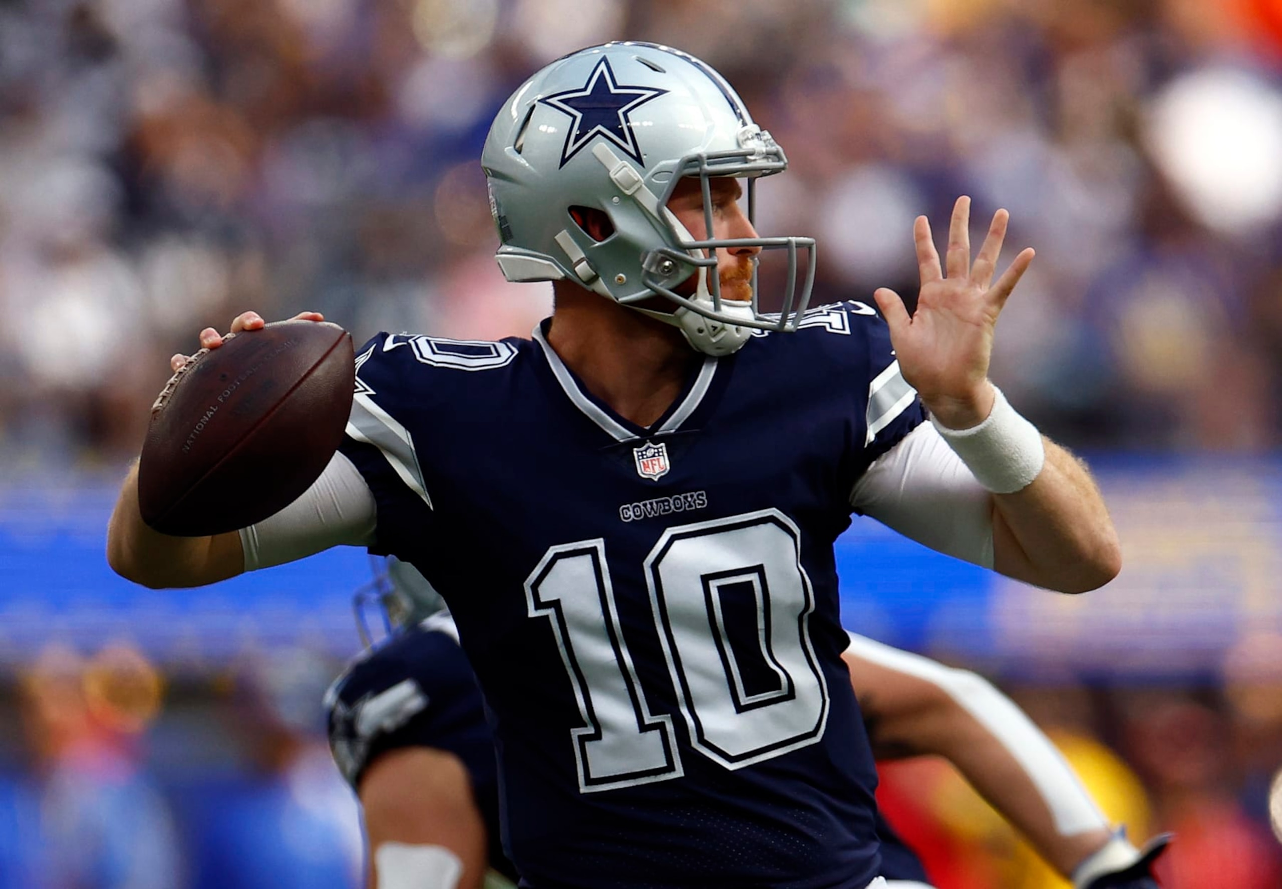 INGLEWOOD, CALIFORNIA - OCTOBER 09:   Cooper Rush #10 of the Dallas Cowboys throws the ball against the Los Angeles Rams at SoFi Stadium on October 09, 2022 in Inglewood, California. (Photo by Ronald Martinez/Getty Images)