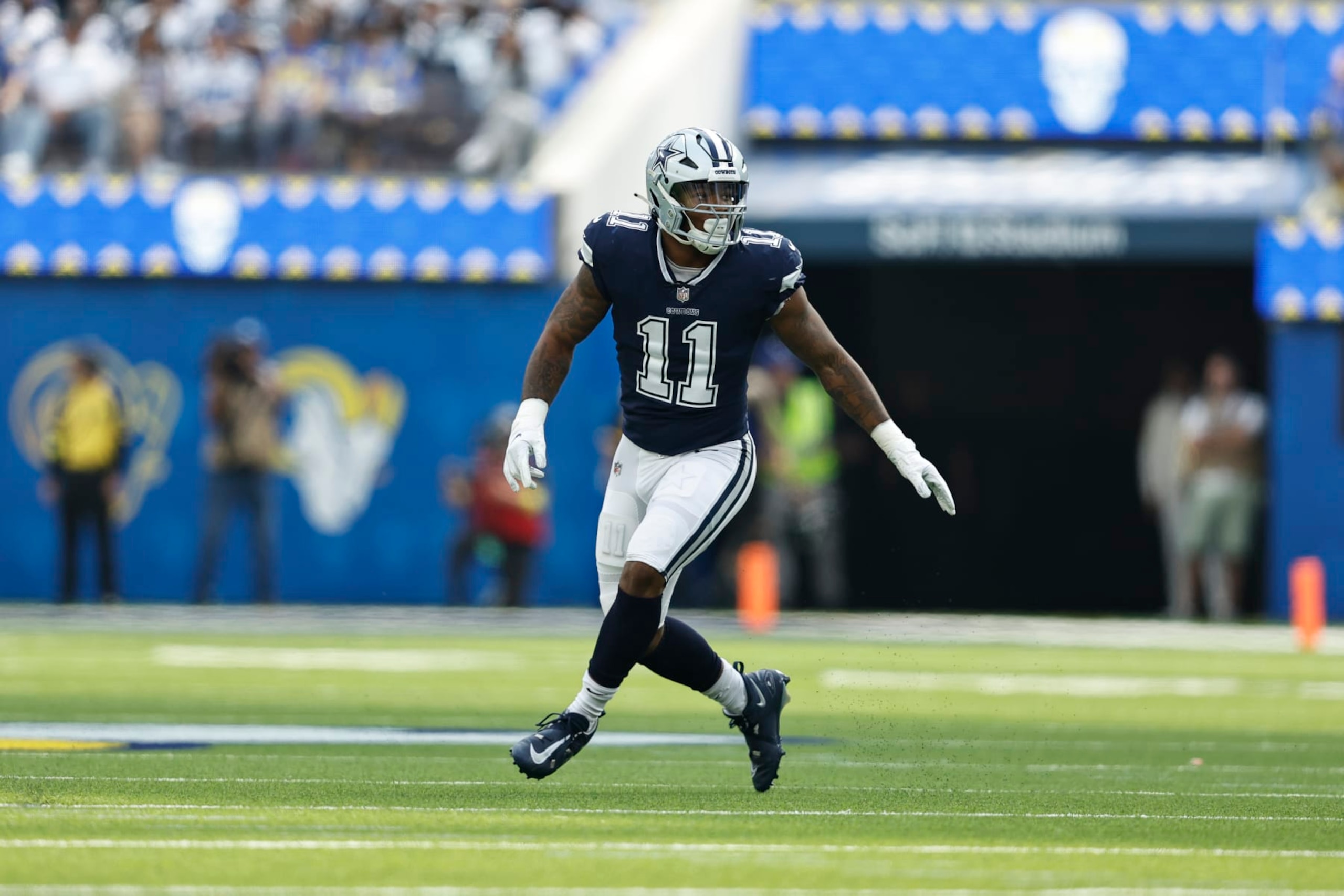 INGLEWOOD, CALIFORNIA - OCTOBER 09: Micah Parsons #11 of the Dallas Cowboys defends against the Los Angeles Rams during the first half of a game at SoFi Stadium on October 09, 2022 in Inglewood, California. (Photo by Michael Owens/Getty Images)