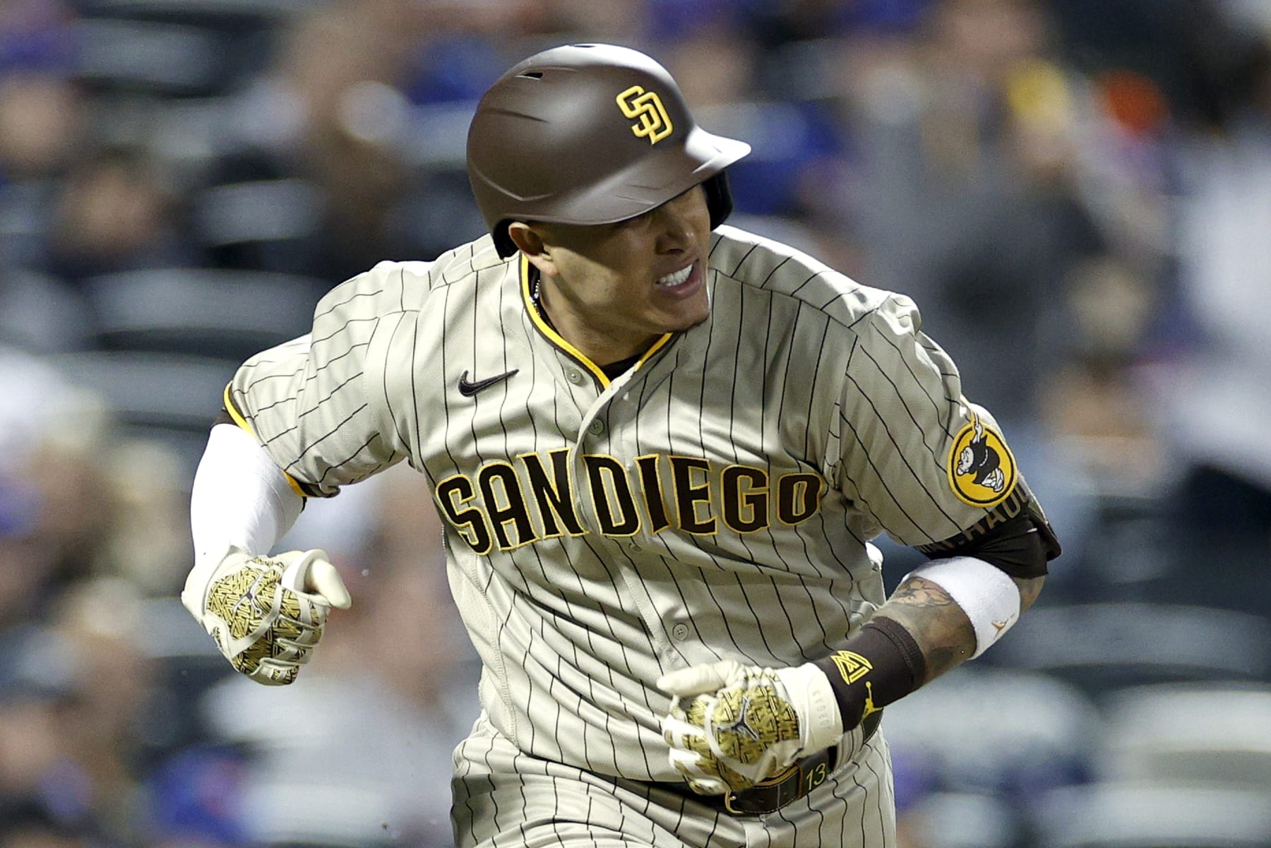 NEW YORK, NEW YORK - OCTOBER 09: Manny Machado #13 of the San Diego Padres celebrates after hitting an RBI single to score Jurickson Profar #10 against the New York Mets during the fifth inning in game three of the National League Wild Card Series at Citi Field on October 09, 2022 in the Flushing neighborhood of the Queens borough of New York City. (Photo by Sarah Stier/Getty Images)