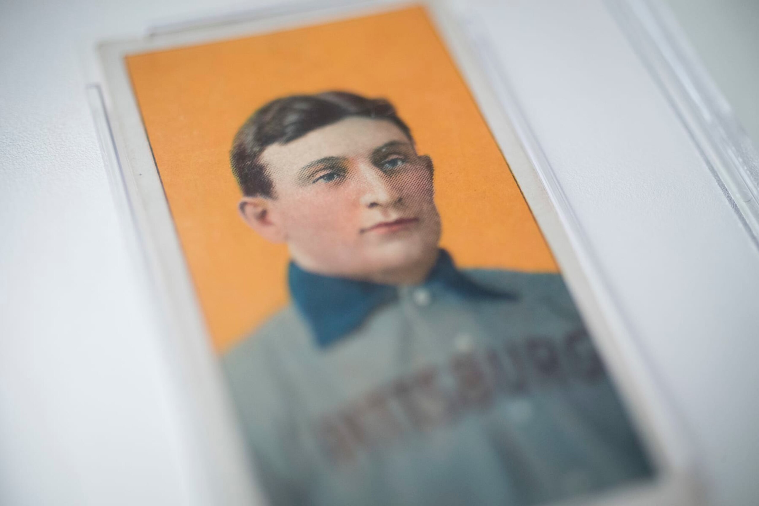 The 1909 baseball card of Pittsburgh Pirates shortstop Honus Wagner is displayed for a photograph in New York, U.S., on Tuesday, Feb. 19, 2013. The trading card that the National Baseball Hall of Fame calls the sport's "most famous collectible" will be up for sale starting Feb. 25,  and might fetch more than $2.8 million, according to the auction house. Photographer: Scott Eells/Bloomberg via Getty Images