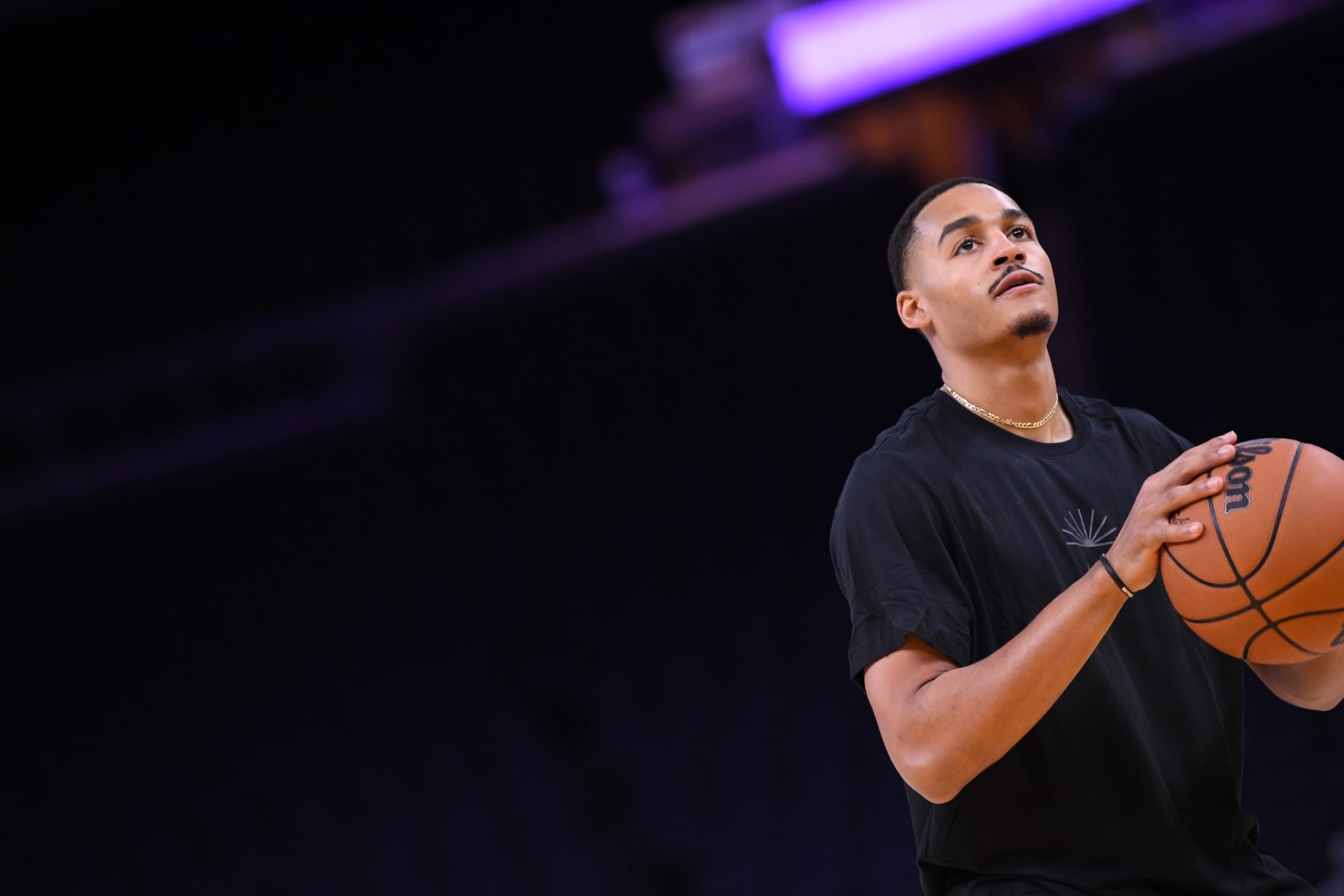 SAN FRANCISCO, CA - OCTOBER 9: Jordan Poole #3 of the Golden State Warriors warms up before the game against the Los Angeles Lakers  on October 9, 2022 at Chase Center in San Francisco, California. NOTE TO USER: User expressly acknowledges and agrees that, by downloading and or using this photograph, user is consenting to the terms and conditions of Getty Images License Agreement. Mandatory Copyright Notice: Copyright 2022 NBAE (Photo by Noah Graham/NBAE via Getty Images)