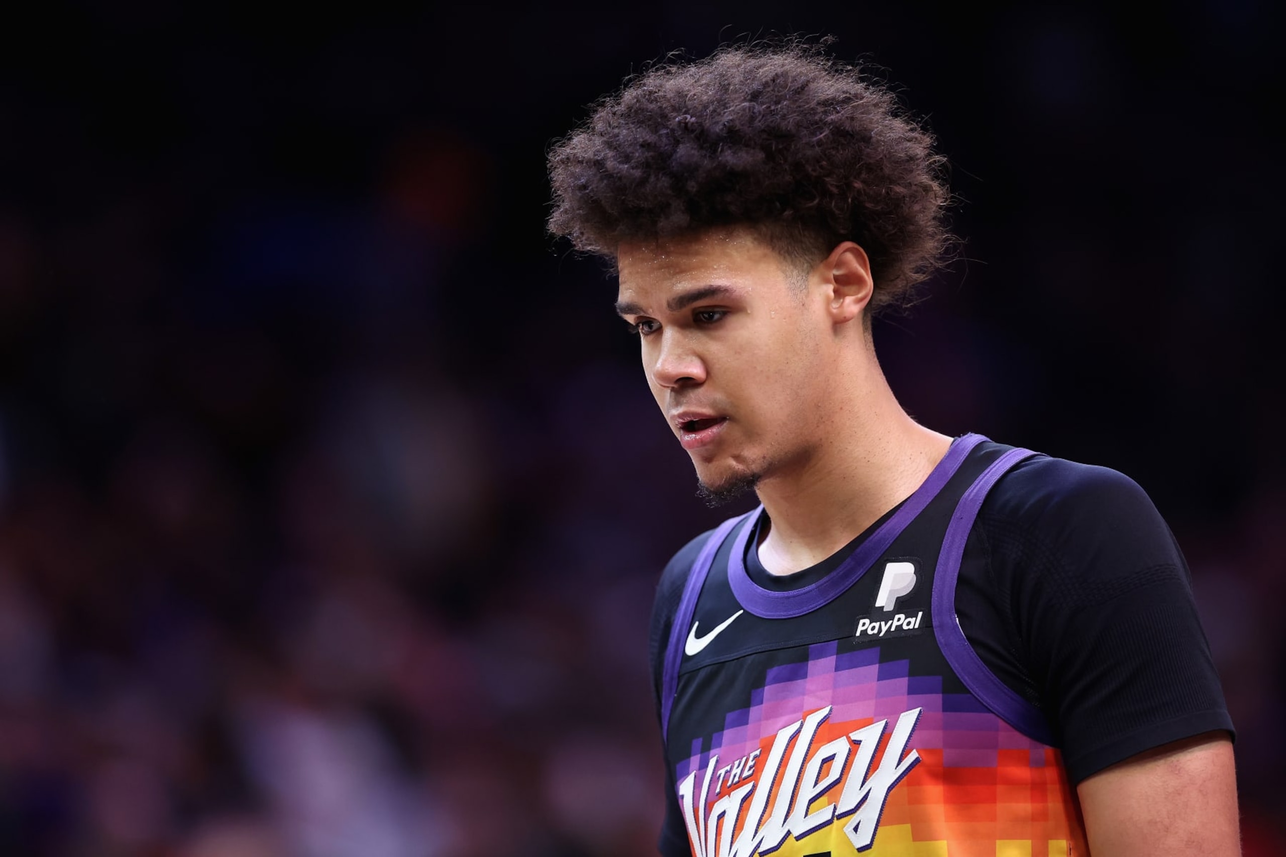 PHOENIX, ARIZONA - MAY 15: Cameron Johnson #23 of the Phoenix Suns walks to the locker room at halftime of Game Seven of the Western Conference Second Round NBA Playoffs against the Dallas Mavericks at Footprint Center on May 15, 2022 in Phoenix, Arizona.  The Mavericks defeated the Suns 123-90.  NOTE TO USER: User expressly acknowledges and agrees that, by downloading and or using this photograph, User is consenting to the terms and conditions of the Getty Images License Agreement. (Photo by Christian Petersen/Getty Images)