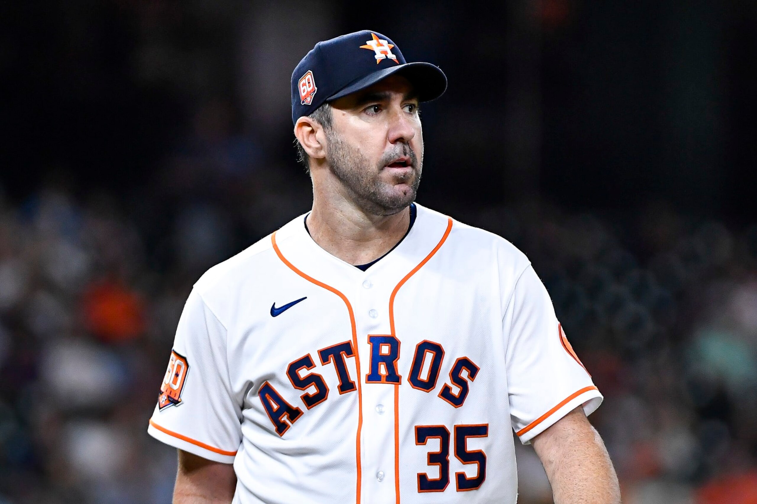 HOUSTON, TEXAS - OCTOBER 04: Justin Verlander #35 of the Houston Astros walks to the dugout at the end of the first inning during the game against the Philadelphia Phillies at Minute Maid Park on October 04, 2022 in Houston, Texas. (Photo by Logan Riely/Getty Images)