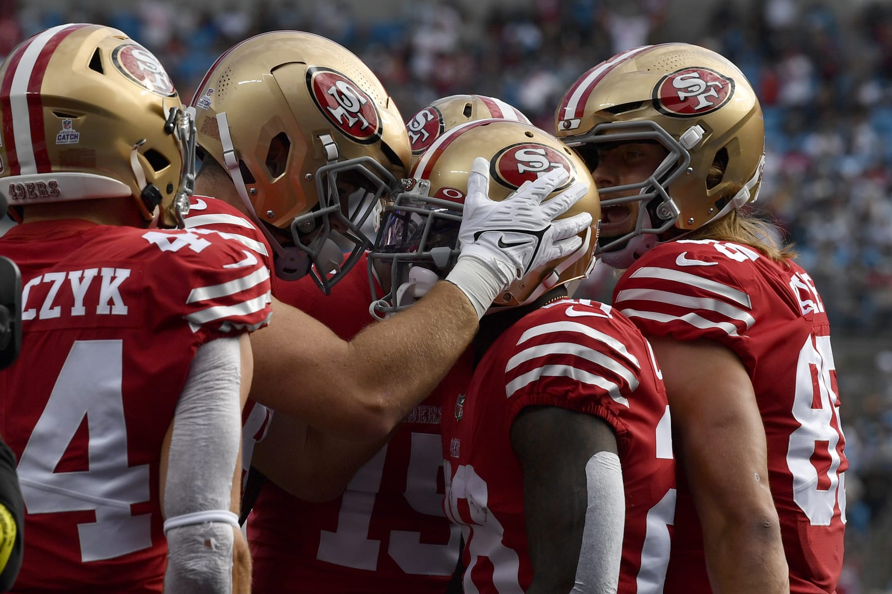 CHARLOTTE, NORTH CAROLINA - OCTOBER 09: Tevin Coleman #28 of the San Francisco 49ers celebrates a touchdown with teammates during the first half in the game against the Carolina Panthers at Bank of America Stadium on October 09, 2022 in Charlotte, North Carolina. (Photo by Mike Comer/Getty Images)