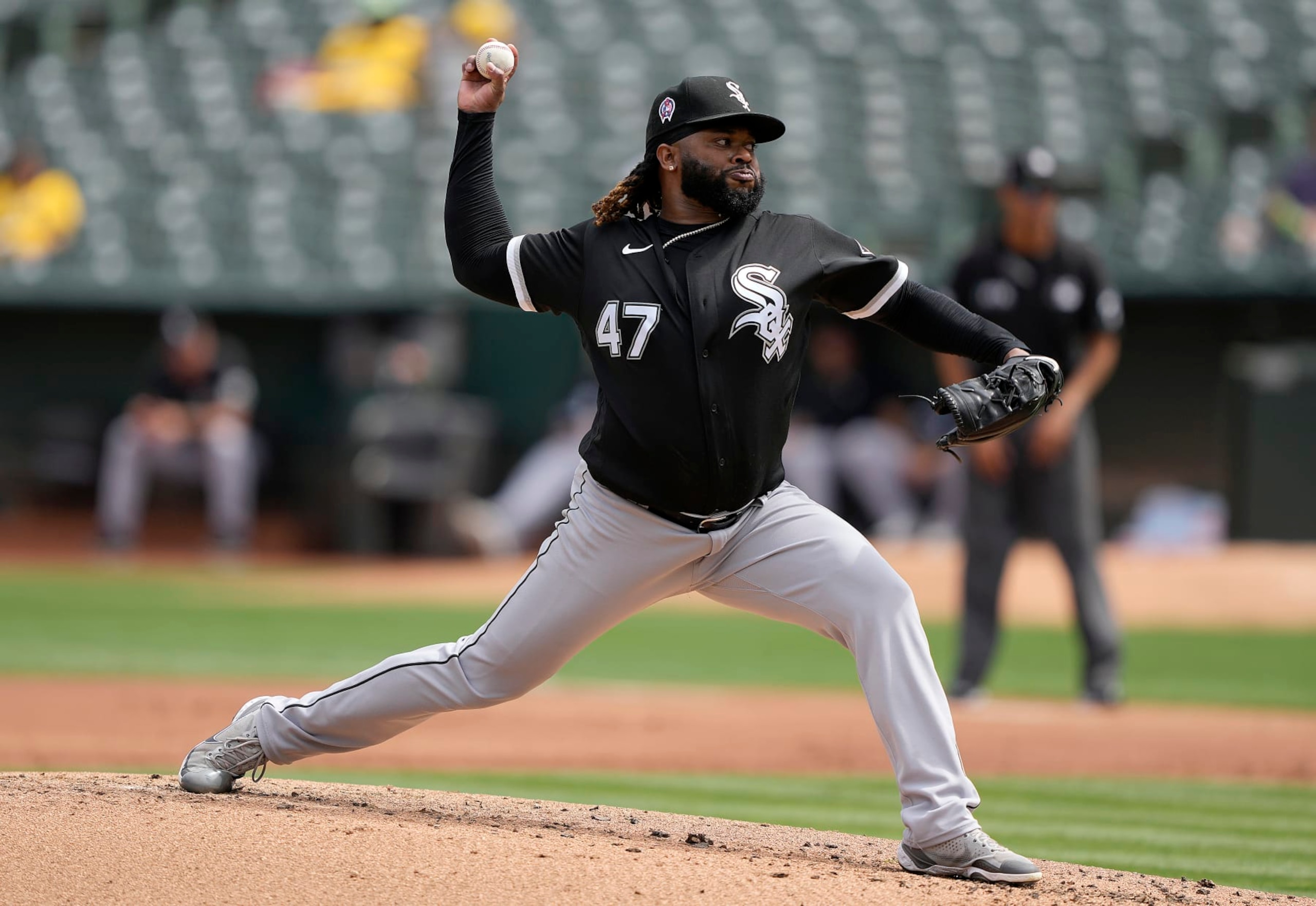 OAKLAND, CALIFORNIA - SEPTEMBER 11: Johnny Cueto #47 of the Chicago White Sox pitches against the Oakland Athletics in the bottom of the first inning at RingCentral Coliseum on September 11, 2022 in Oakland, California. (Photo by Thearon W. Henderson/Getty Images)