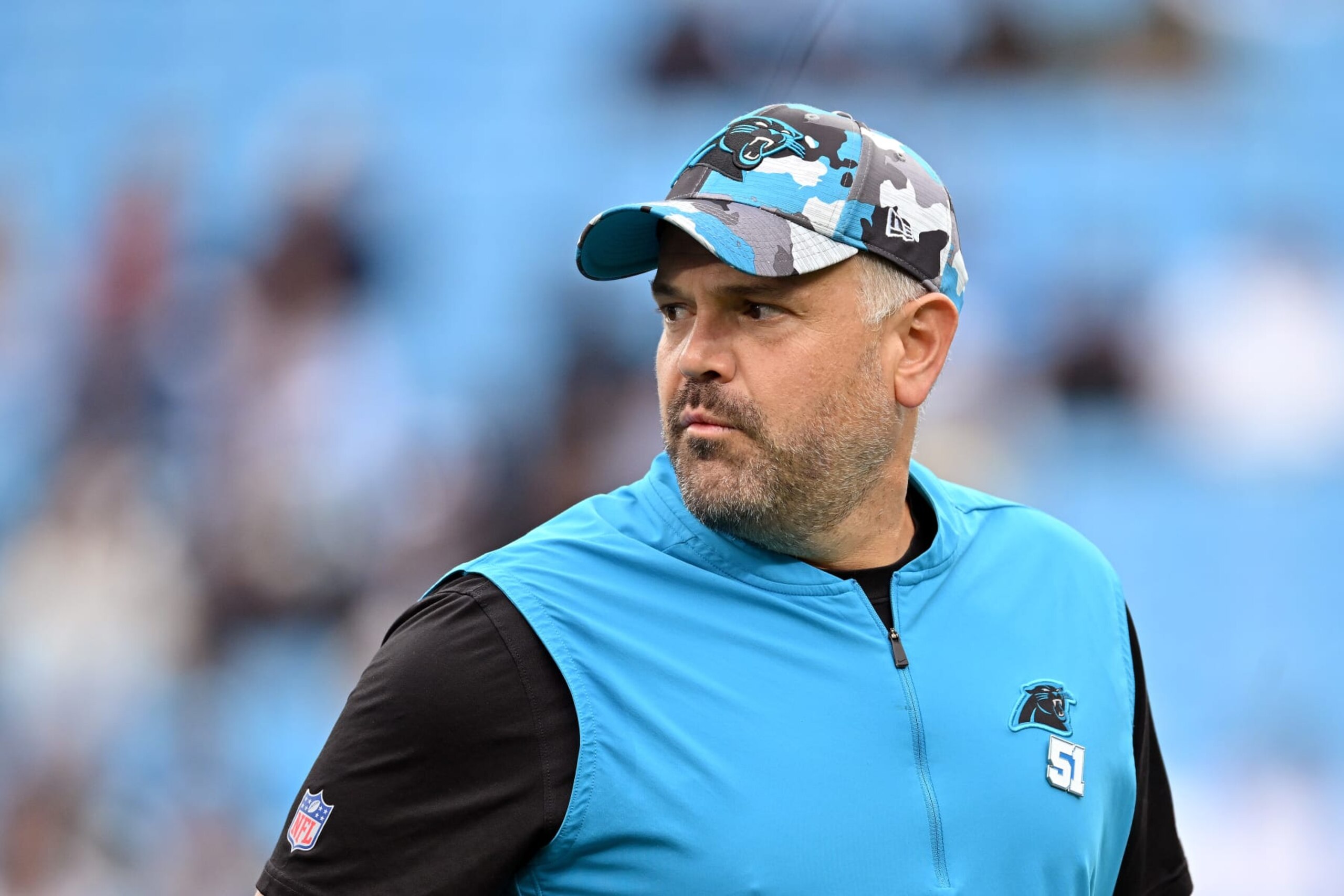 CHARLOTTE, NORTH CAROLINA - OCTOBER 02: Head coach Matt Rhule of the Carolina Panthers watches his team warm up during their game against the Arizona Cardinals at Bank of America Stadium on October 02, 2022 in Charlotte, North Carolina. (Photo by Grant Halverson/Getty Images)