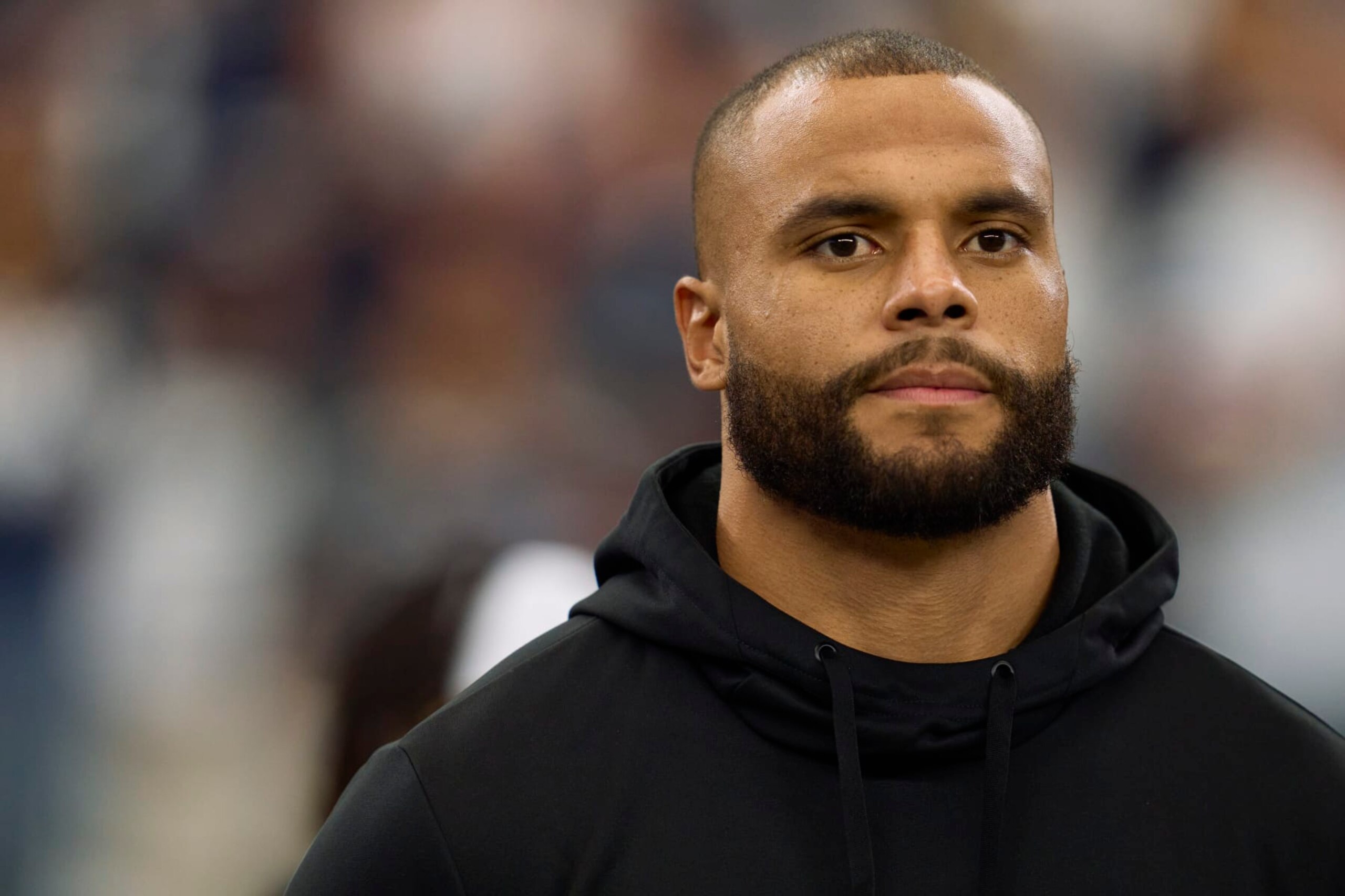 ARLINGTON, TX - OCTOBER 02: Dak Prescott #4 of the Dallas Cowboys looks on before kickoff against the Washington Commanders at AT&T Stadium on October 2, 2022 in Arlington, Texas. (Photo by Cooper Neill/Getty Images)