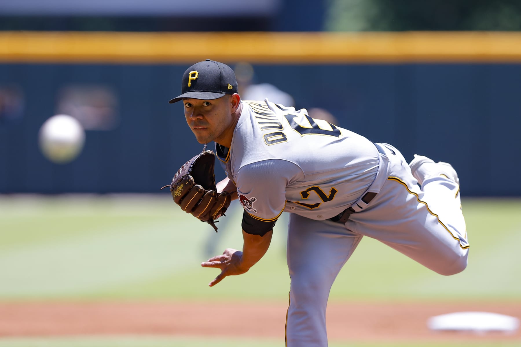 ATLANTA, GA - JUNE 12: Jose Quintana #62 of the Pittsburgh Pirates throws a warm up pitch during the first inning against the Atlanta Braves at Truist Park on June 12, 2022 in Atlanta, Georgia. (Photo by Todd Kirkland/Getty Images)