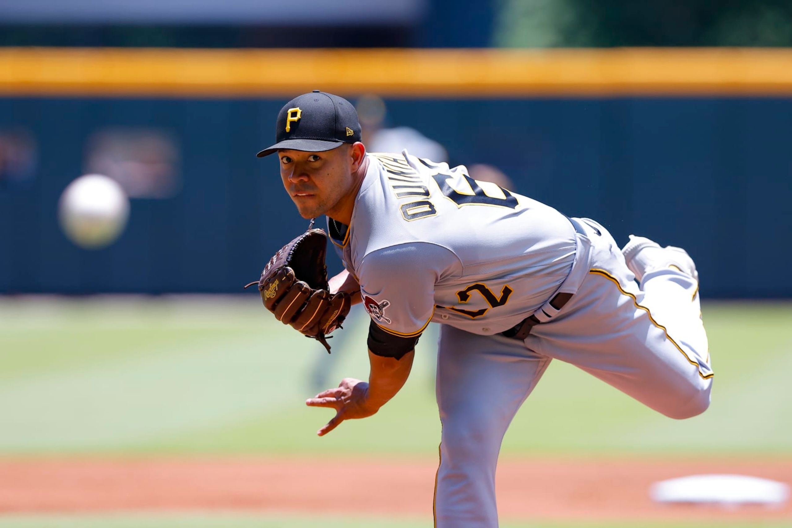 ATLANTA, GA - JUNE 12: Jose Quintana #62 of the Pittsburgh Pirates throws a warm up pitch during the first inning against the Atlanta Braves at Truist Park on June 12, 2022 in Atlanta, Georgia. (Photo by Todd Kirkland/Getty Images)