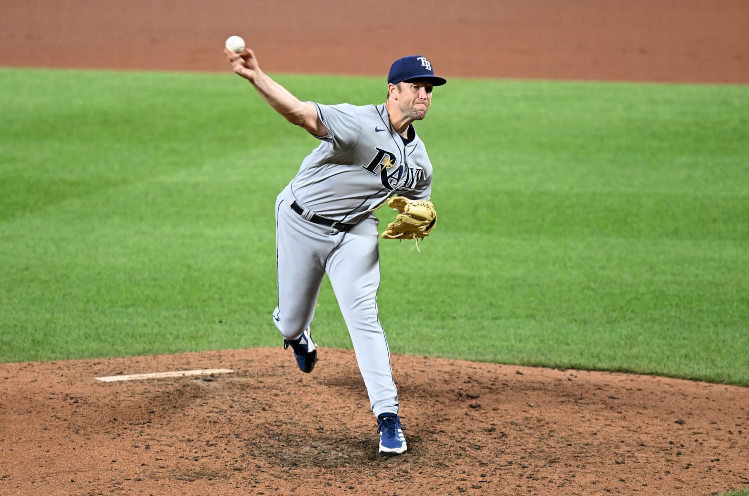 BALTIMORE, MARYLAND - JULY 27: Jason Adam #47 of the Tampa Bay Rays pitches against the Baltimore Orioles at Oriole Park at Camden Yards on July 27, 2022 in Baltimore, Maryland. (Photo by G Fiume/Getty Images)