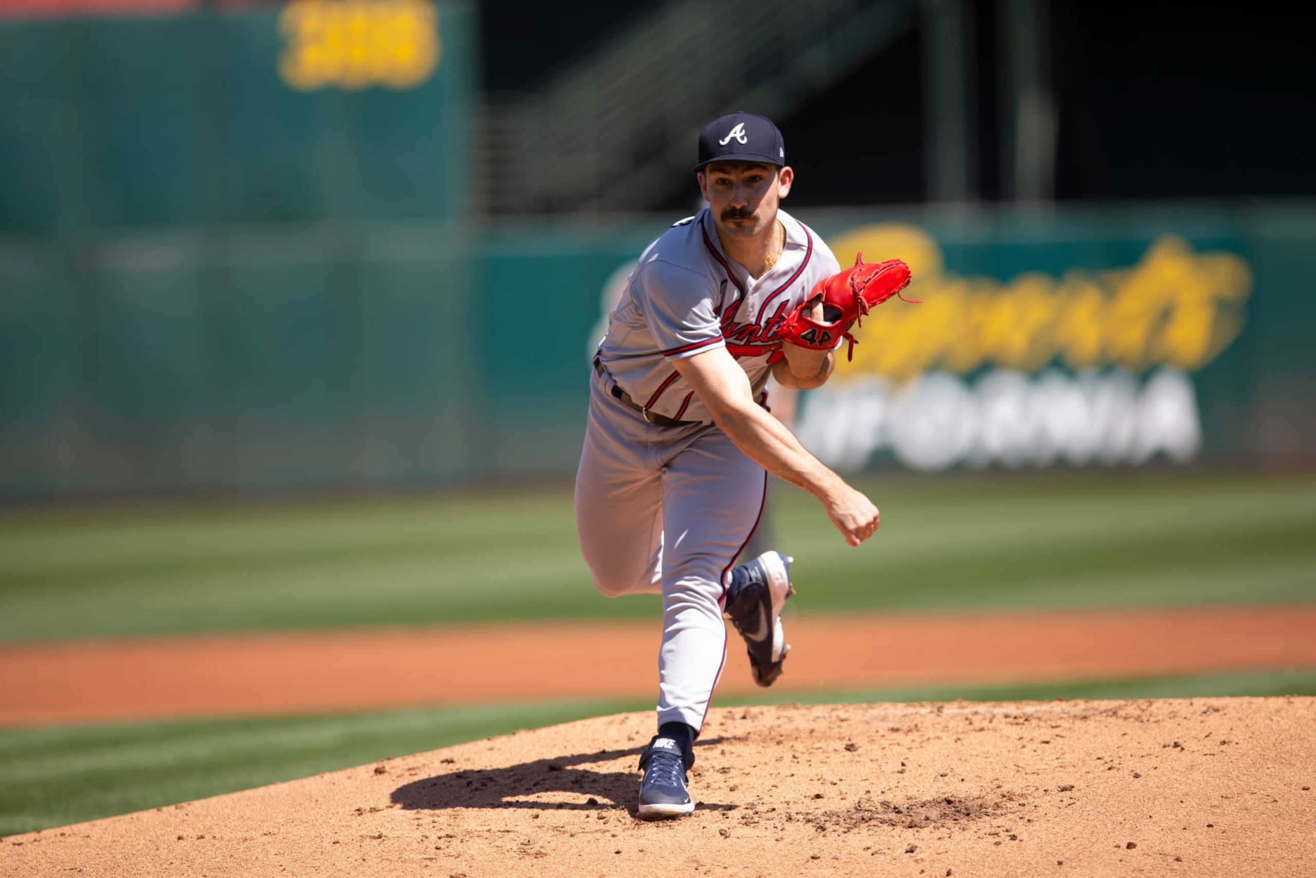 OAKLAND, CA - SEPTEMBER 7: Spencer Strider #65 of the Atlanta Braves pitches during the game against the Oakland Athletics at RingCentral Coliseum on September 7, 2022 in Oakland, California. The Braves defeated the Athletics 7-3. (Photo by Michael Zagaris/Oakland Athletics/Getty Images)