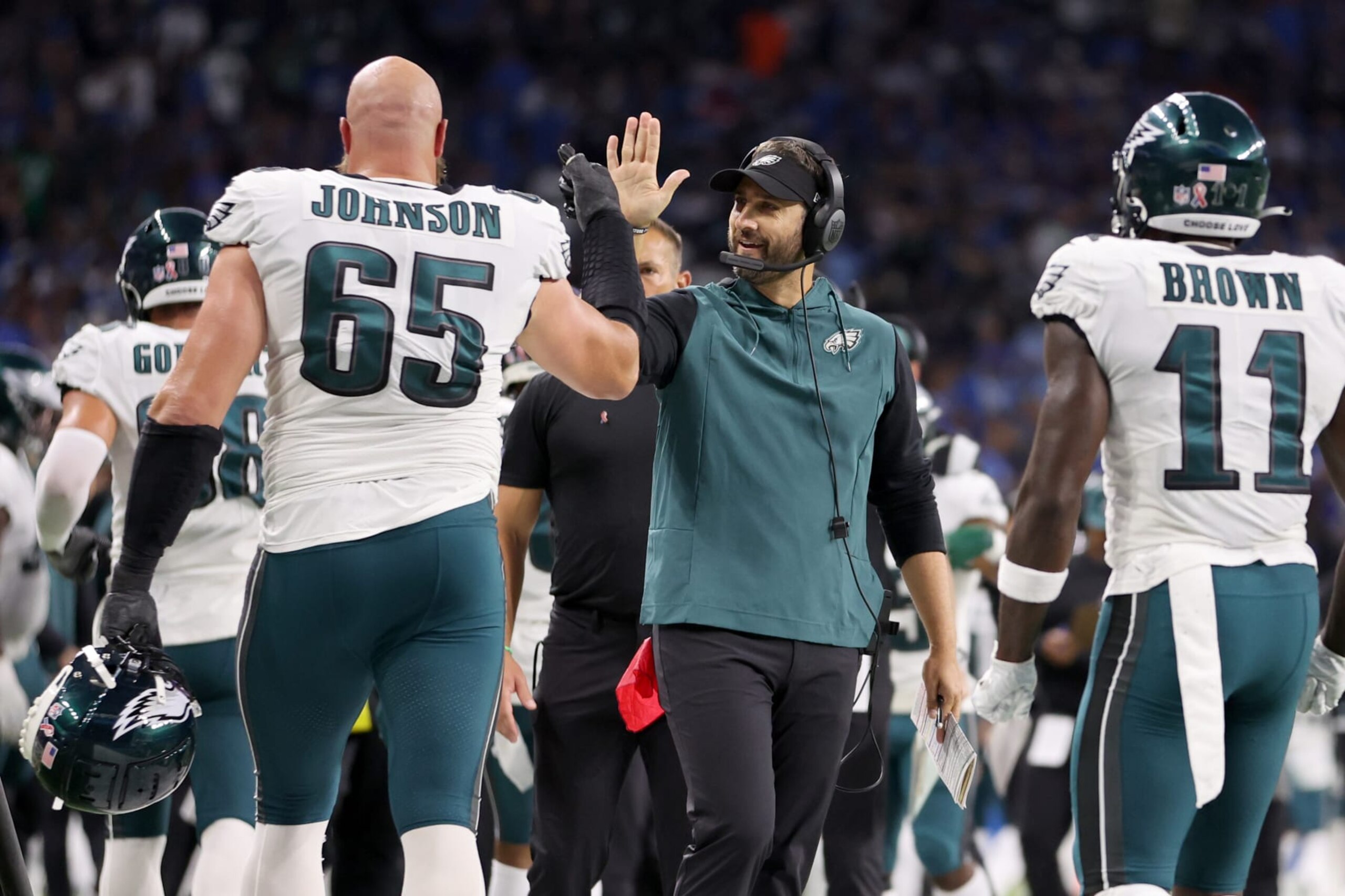 DETROIT, MICHIGAN - SEPTEMBER 11: Head coach Nick Sirianni of the Philadelphia Eagles celebrates with Lane Johnson #65 of the Philadelphia Eagles after a touchdown in the game against the Detroit Lions at Ford Field on September 11, 2022 in Detroit, Michigan. (Photo by Gregory Shamus/Getty Images)