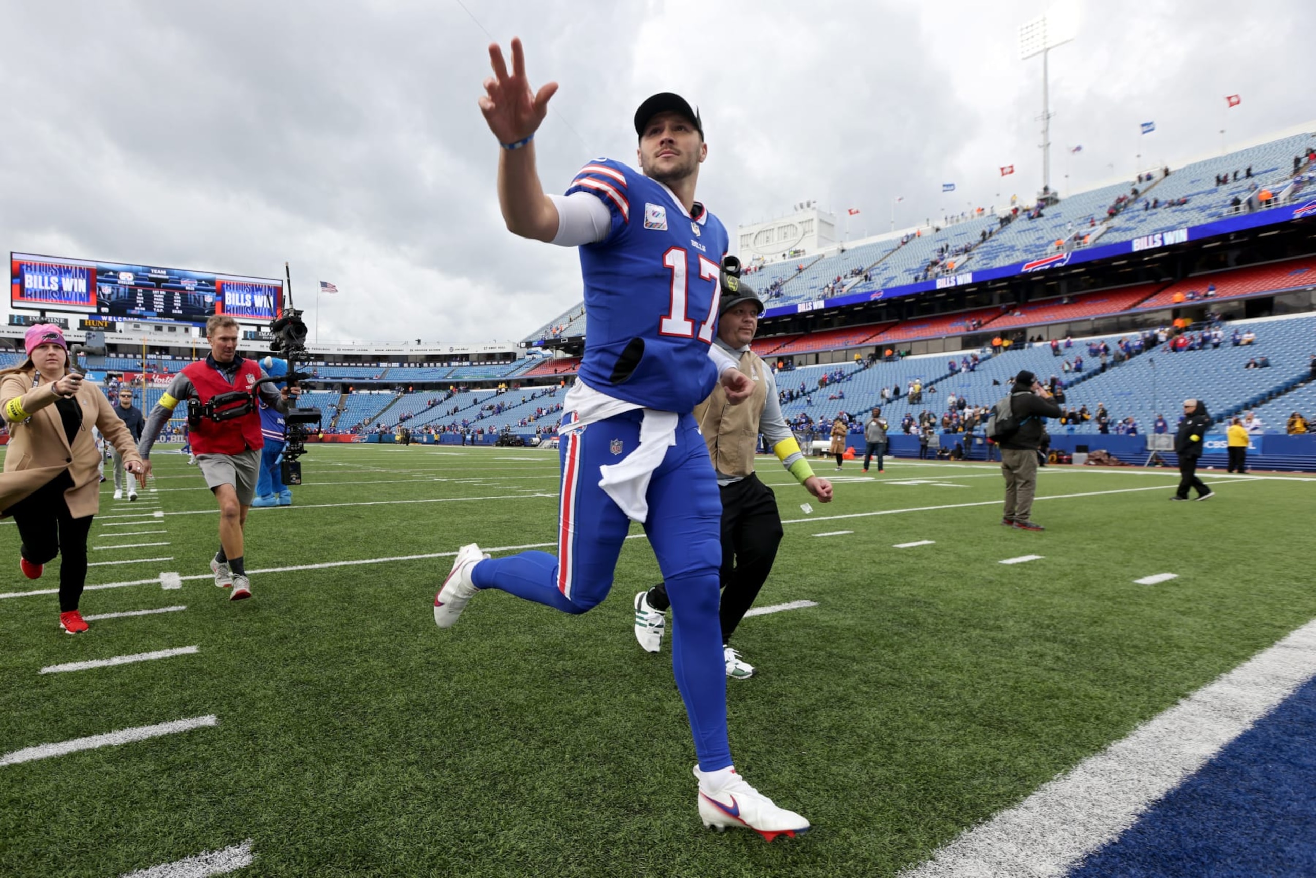 ORCHARD PARK, NEW YORK - OCTOBER 09: Josh Allen #17 of the Buffalo Bills runs off thee field after a win against the Pittsburgh Steelers at Highmark Stadium on October 09, 2022 in Orchard Park, New York. (Photo by Bryan M. Bennett/Getty Images)