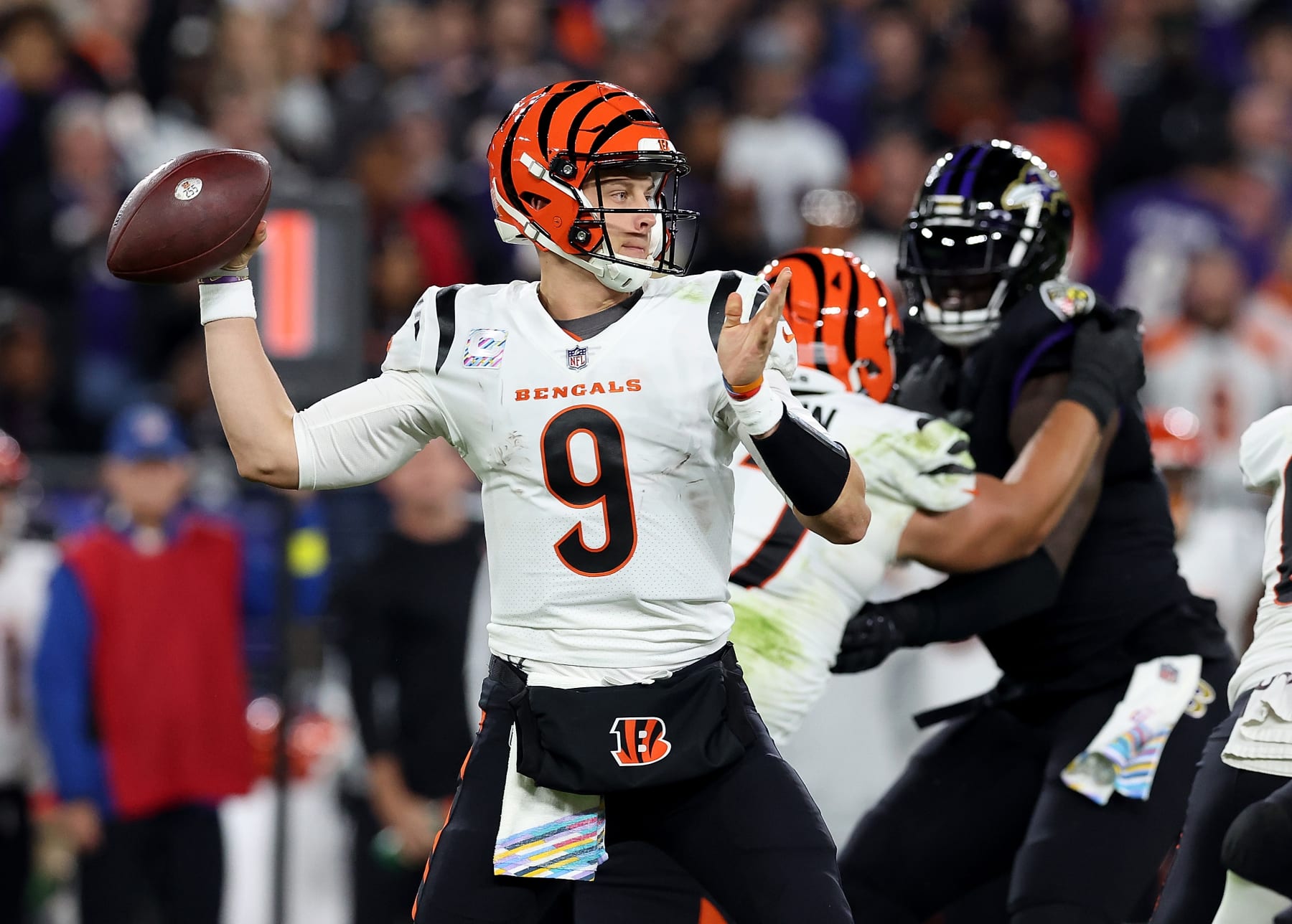 BALTIMORE, MARYLAND - OCTOBER 09:  Joe Burrow #9 of the Cincinnati Bengals looks to pass against the Baltimore Ravens in the second quarter at M&T Bank Stadium on October 09, 2022 in Baltimore, Maryland. (Photo by Todd Olszewski/Getty Images)