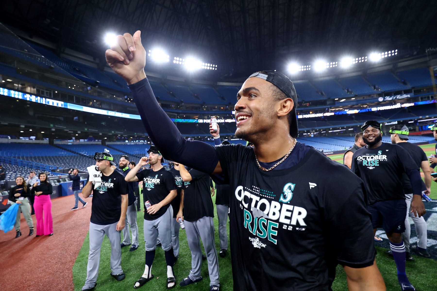 TORONTO, ONTARIO - OCTOBER 08: Julio Rodriguez #44 of the Seattle Mariners celebrates on the field after defeating the Toronto Blue Jays in game two to win the American League Wild Card Series at Rogers Centre on October 08, 2022 in Toronto, Ontario. (Photo by Vaughn Ridley/Getty Images)