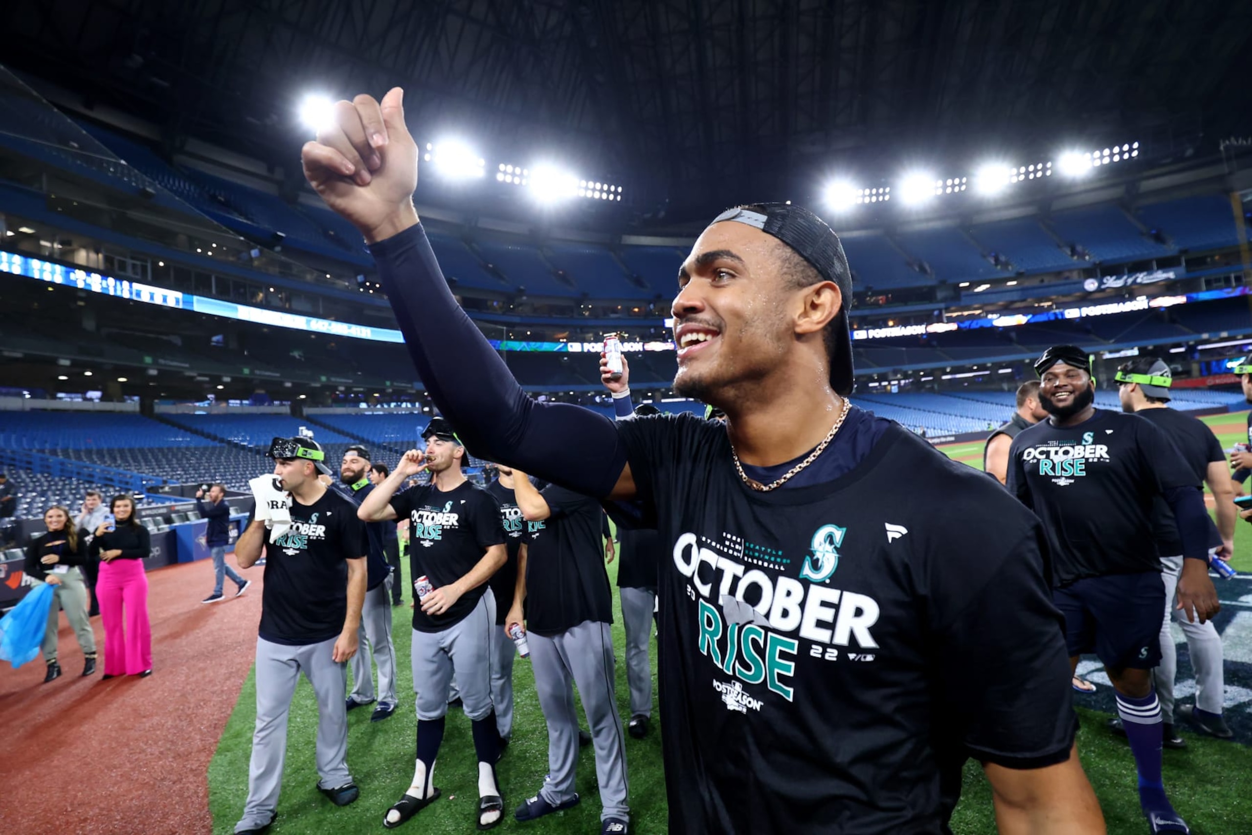 TORONTO, ONTARIO - OCTOBER 08: Julio Rodriguez #44 of the Seattle Mariners celebrates on the field after defeating the Toronto Blue Jays in game two to win the American League Wild Card Series at Rogers Centre on October 08, 2022 in Toronto, Ontario. (Photo by Vaughn Ridley/Getty Images)