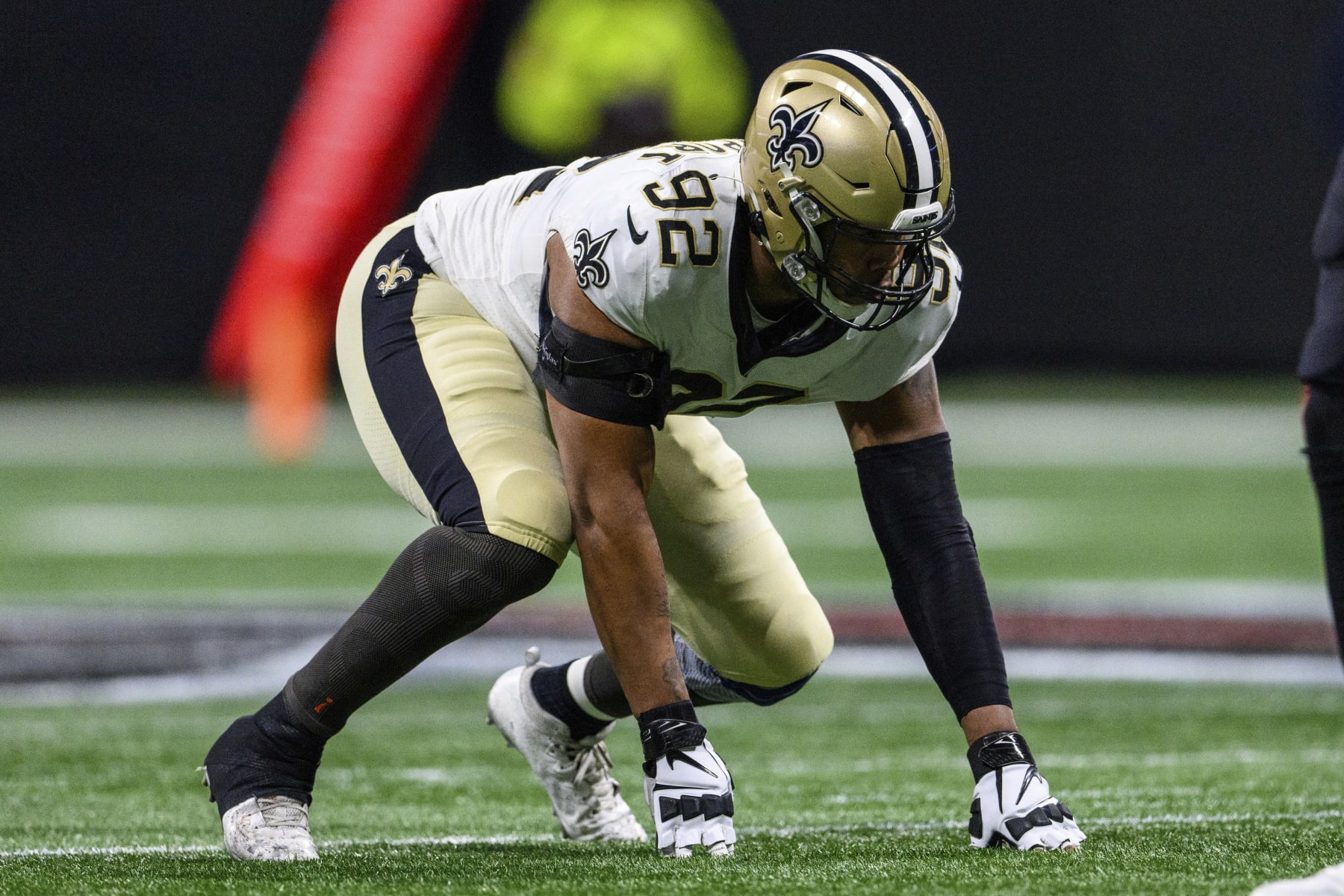 New Orleans Saints defensive end Marcus Davenport (92) lines up during the first half of an NFL football game against the Atlanta Falcons, Sunday, Jan. 9, 2022, in Atlanta. The New Orleans Saints won 30-20. (AP Photo/Danny Karnik)