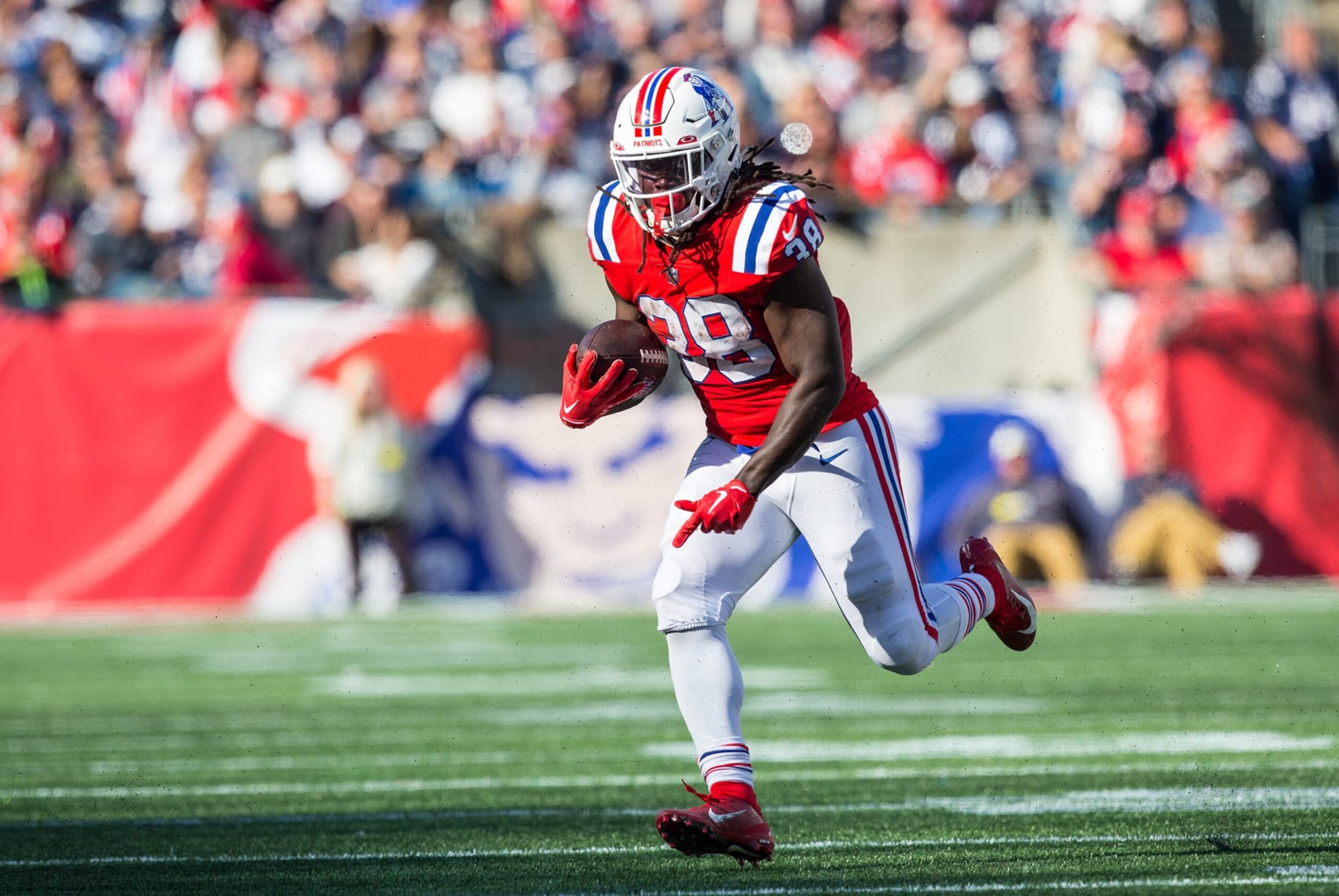 FOXBOROUGH, MA - OCTOBER 09: New England Patriots running back Rhamondre Stevenson (38) runs with the ball during a NFL game between Detroit Lions and New England Patriots on October 9, 2022, at Gillette Stadium in Foxborough, MA. (Photo by M. Anthony Nesmith/Icon Sportswire via Getty Images)