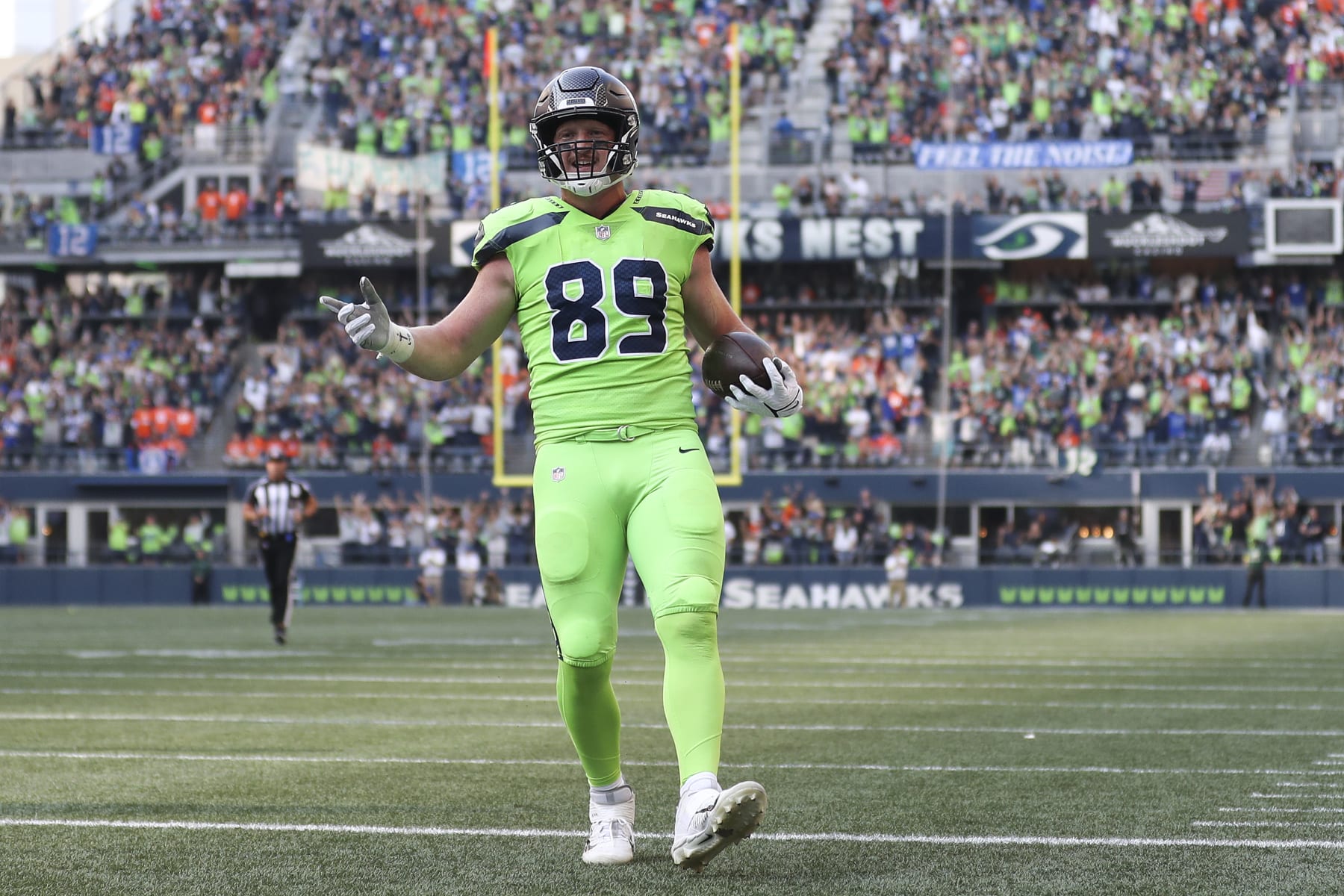 SEATTLE, WASHINGTON - SEPTEMBER 12: Will Dissly #89 of the Seattle Seahawks scores a touchdown during the first quarter against the Denver Broncos at Lumen Field on September 12, 2022 in Seattle, Washington. (Photo by Steph Chambers/Getty Images)