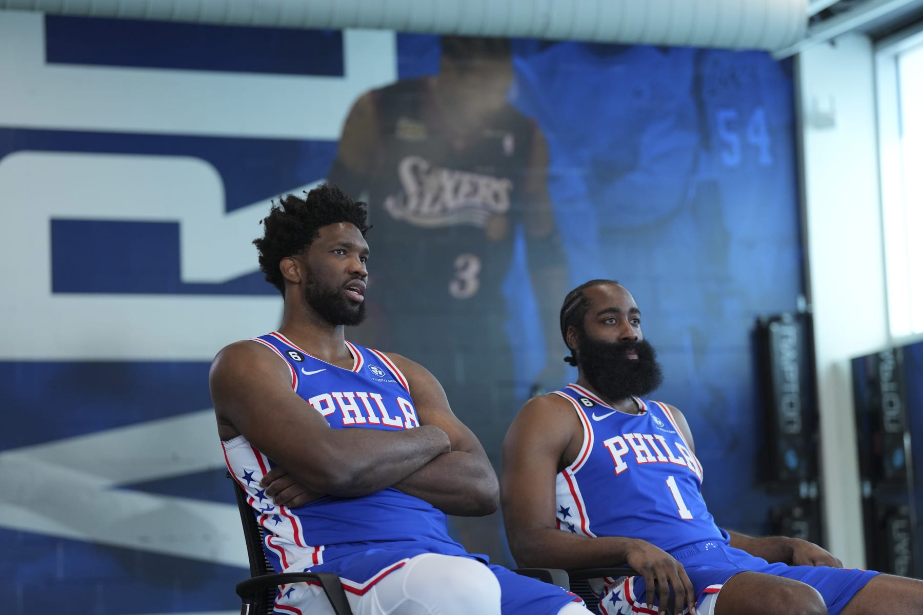 CAMDEN, NJ - SEPTEMBER 26: Joel Embiid #21 and James Harden #1 of the Philadelphia 76ers sit for an interview during media day at the 76ers Training Complex on September 26, 2022 in Camden, New Jersey. NOTE TO USER: User expressly acknowledges and agrees that, by downloading and or using this photograph, User is consenting to the terms and conditions of the Getty Images License Agreement. (Photo by Mitchell Leff/Getty Images)
