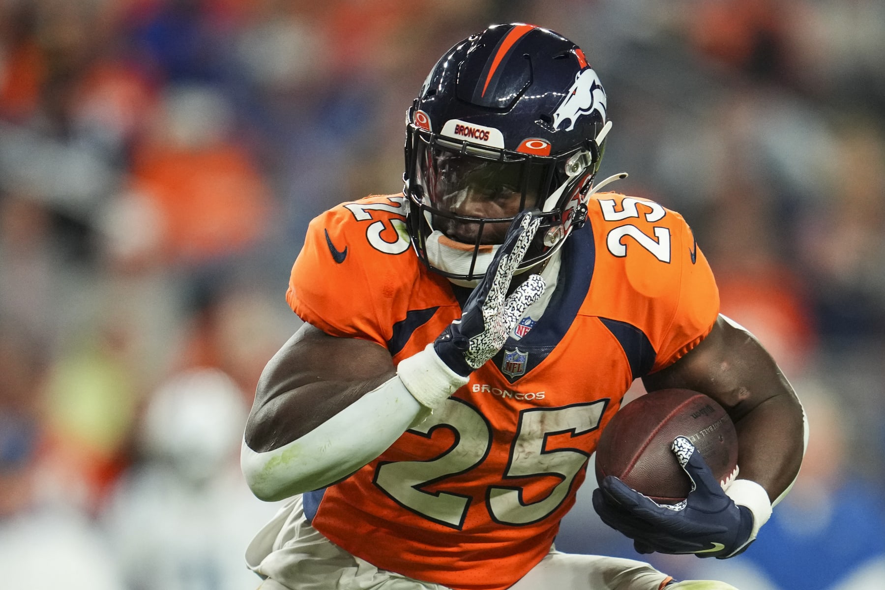 DENVER, CO - OCTOBER 06: Melvin Gordon III #25 of the Denver Broncos runs the ball against the Indianapolis Colts at Empower Field at Mile High on October 6, 2022 in Denver, Texas. (Photo by Cooper Neill/Getty Images)