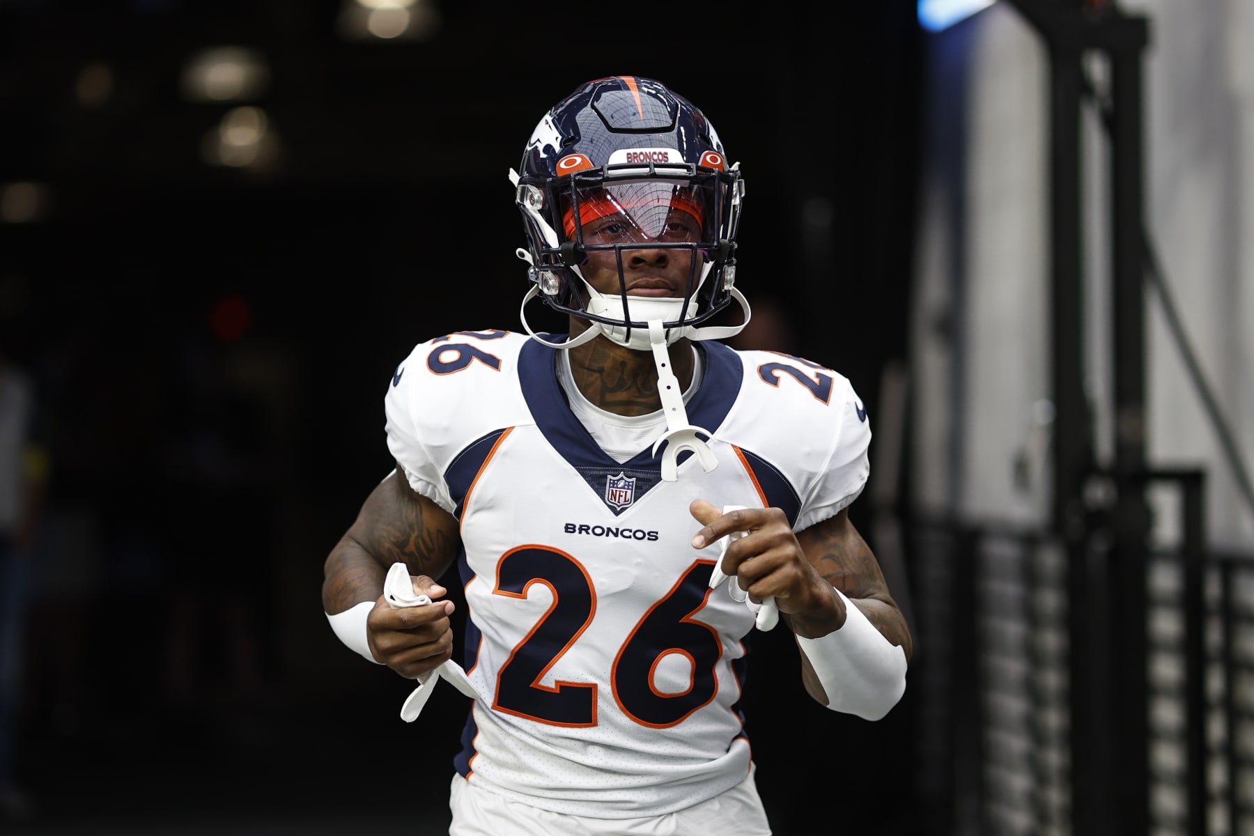 LAS VEGAS, NEVADA - OCTOBER 02: Mike Boone #26 of the Denver Broncos runs prior to an NFL football game between the Las Vegas Raiders and the Denver Broncos at Allegiant Stadium on October 02, 2022 in Las Vegas, Nevada. (Photo by Michael Owens/Getty Images)