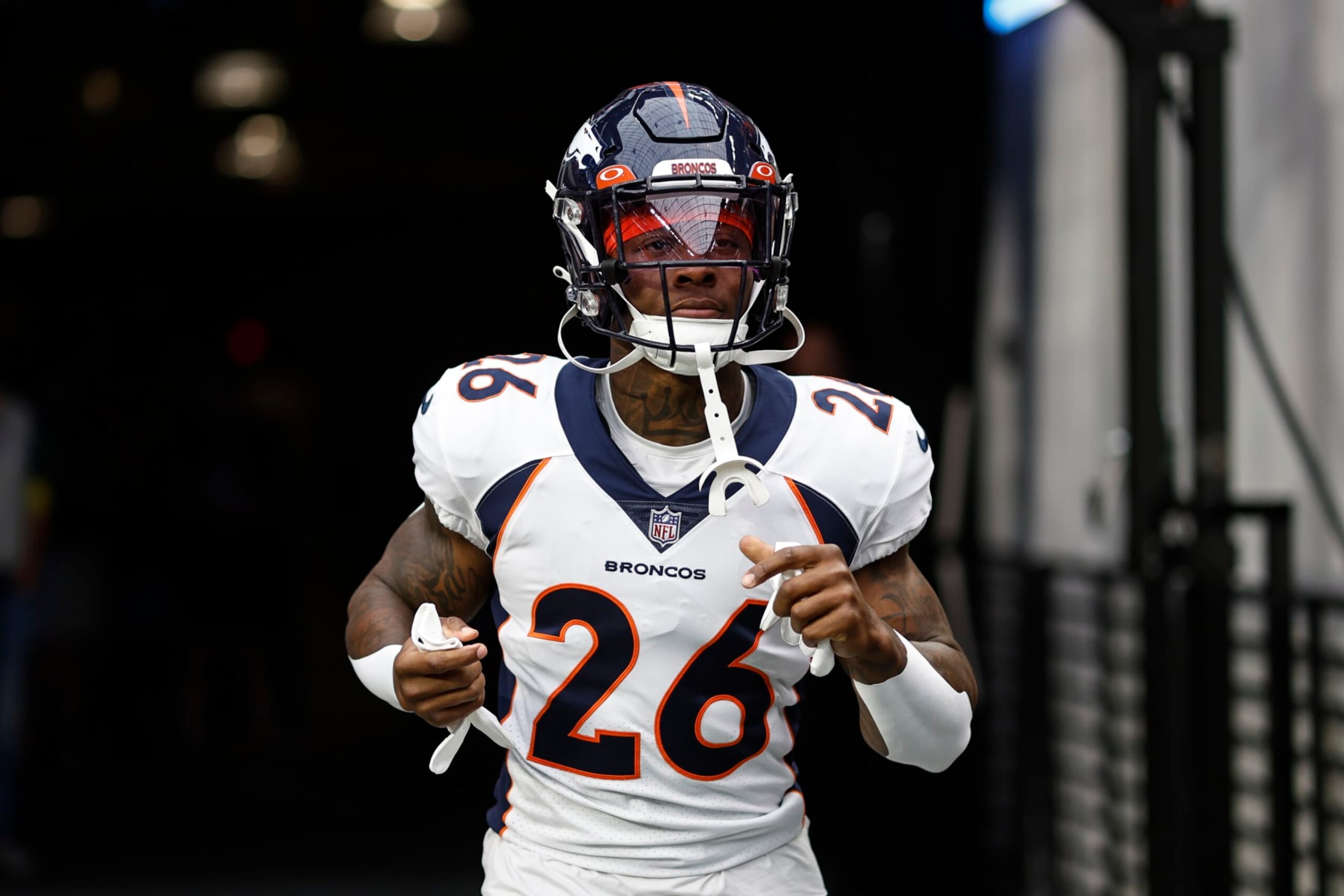 LAS VEGAS, NEVADA - OCTOBER 02: Mike Boone #26 of the Denver Broncos runs prior to an NFL football game between the Las Vegas Raiders and the Denver Broncos at Allegiant Stadium on October 02, 2022 in Las Vegas, Nevada. (Photo by Michael Owens/Getty Images)