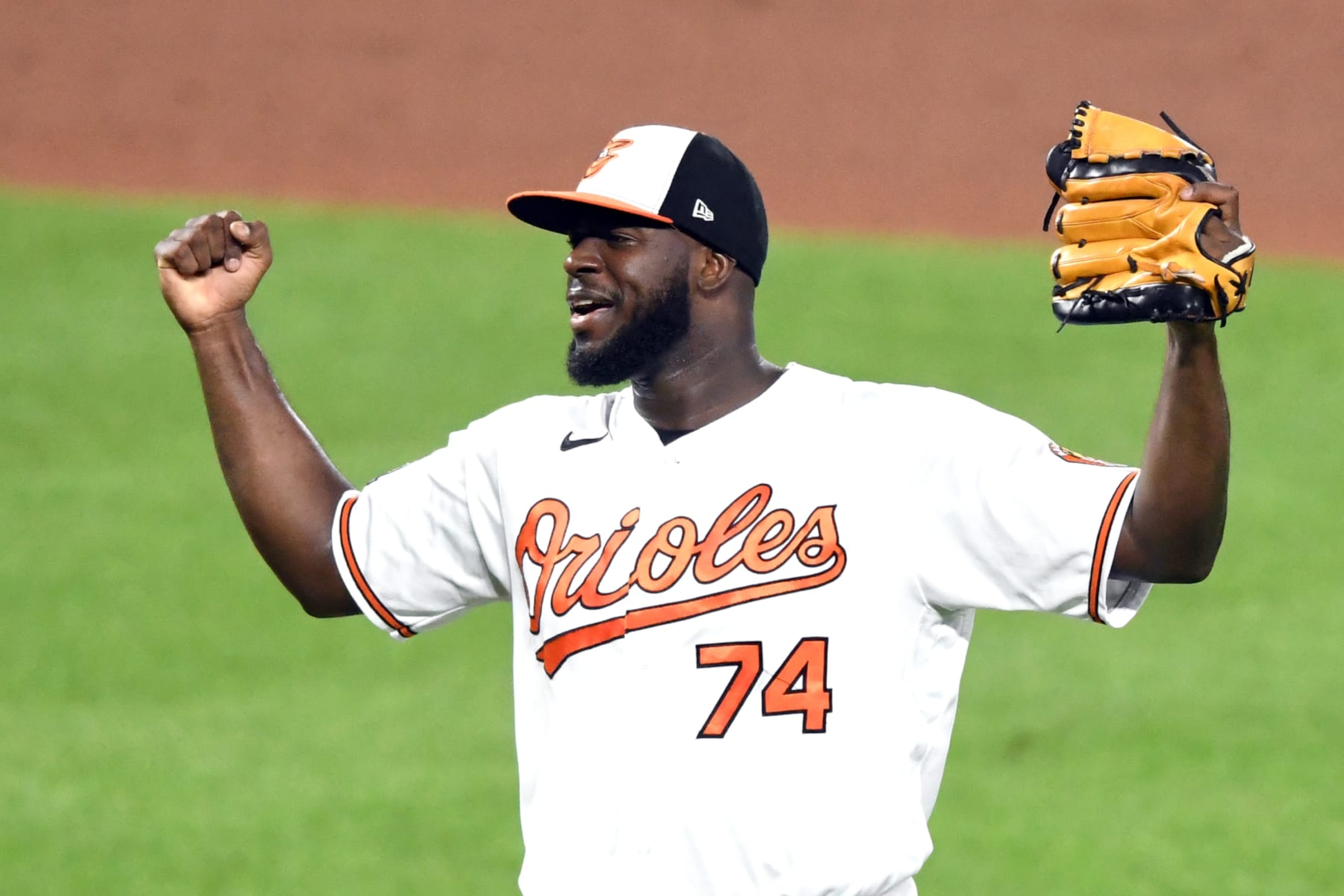 BALTIMORE, MD - AUGUST 08: Felix Bautista #74 of the Baltimore Orioles celebrates a win after a baseball game against the Toronto Blue Jays at Oriole Park at Camden Yards on August 8, 2022 in Baltimore, Maryland. (Photo by Mitchell Layton/Getty Images)