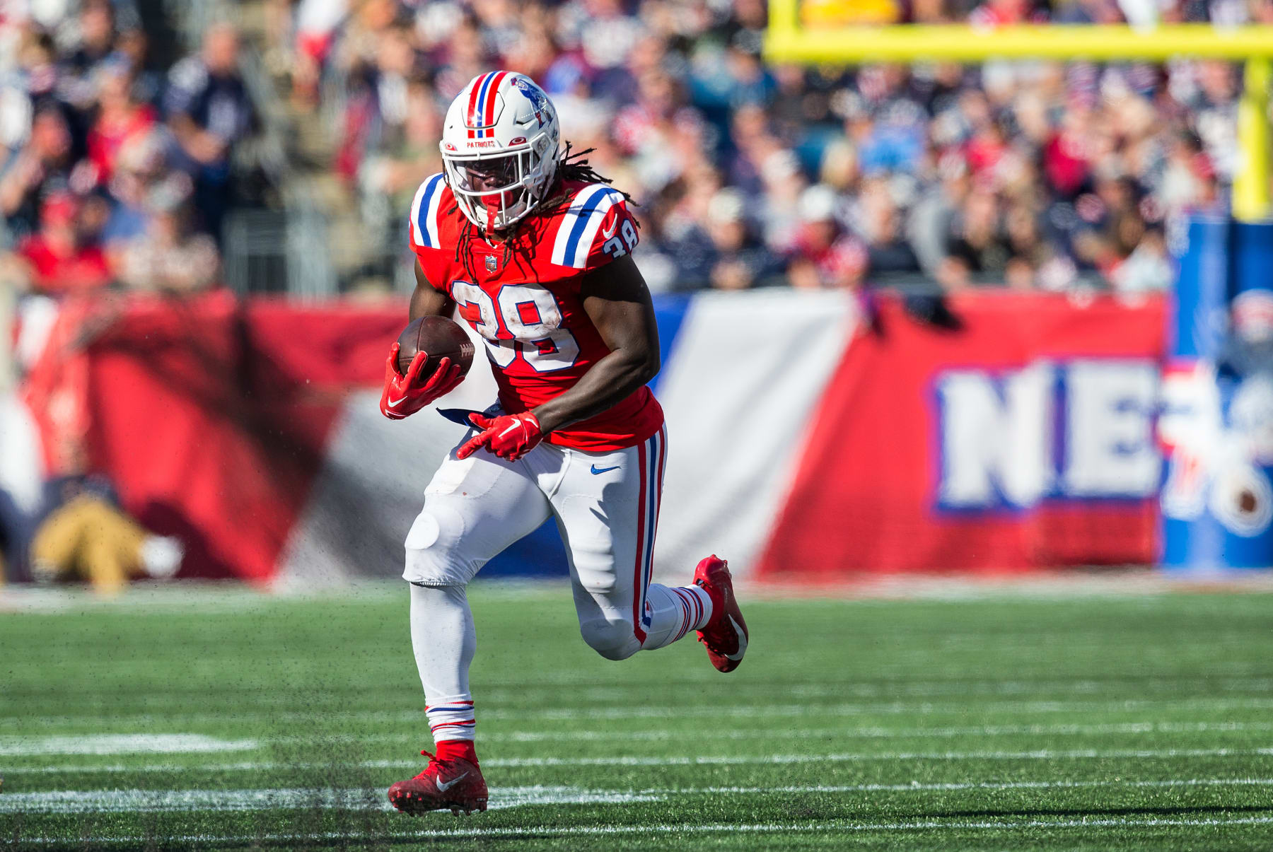 FOXBOROUGH, MA - OCTOBER 09: New England Patriots running back Rhamondre Stevenson (38) runs with the ball during a NFL game between Detroit Lions and New England Patriots on October 9, 2022, at Gillette Stadium in Foxborough, MA. (Photo by M. Anthony Nesmith/Icon Sportswire via Getty Images)