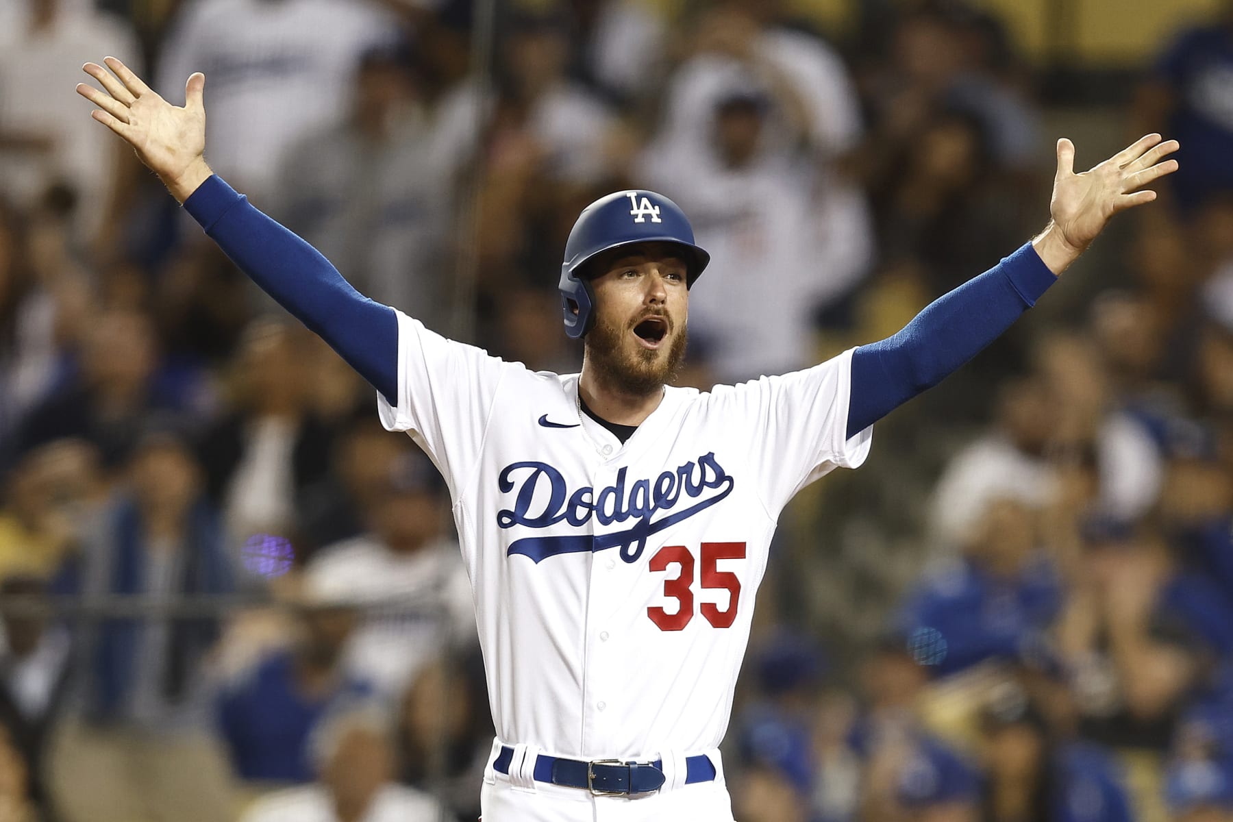 LOS ANGELES, CALIFORNIA - OCTOBER 01: Cody Bellinger #35 of the Los Angeles Dodgers reacts after Mookie Betts #50 hit was ruled a foul ball against the Colorado Rockies during the sixth inning at Dodger Stadium on October 01, 2022 in Los Angeles, California. (Photo by Michael Owens/Getty Images)