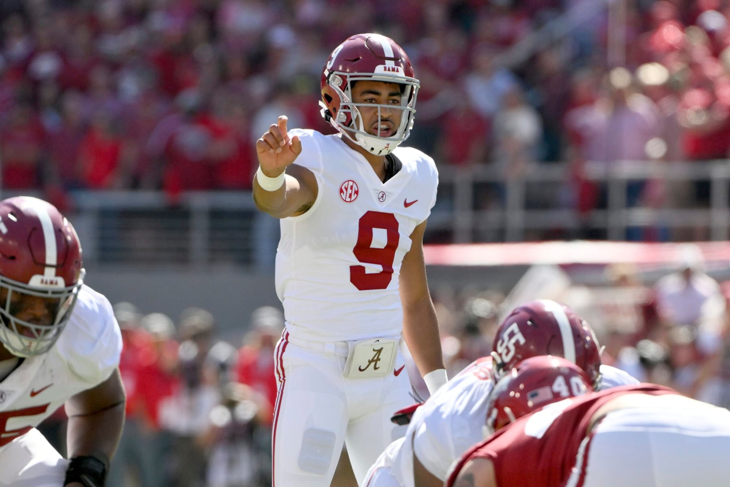 Alabama quarterback Bryce Young (9) gets ready to run a play against Arkansas during the first half of an NCAA college football game Saturday, Oct. 1, 2022, in Fayetteville, Ark. (AP Photo/Michael Woods)