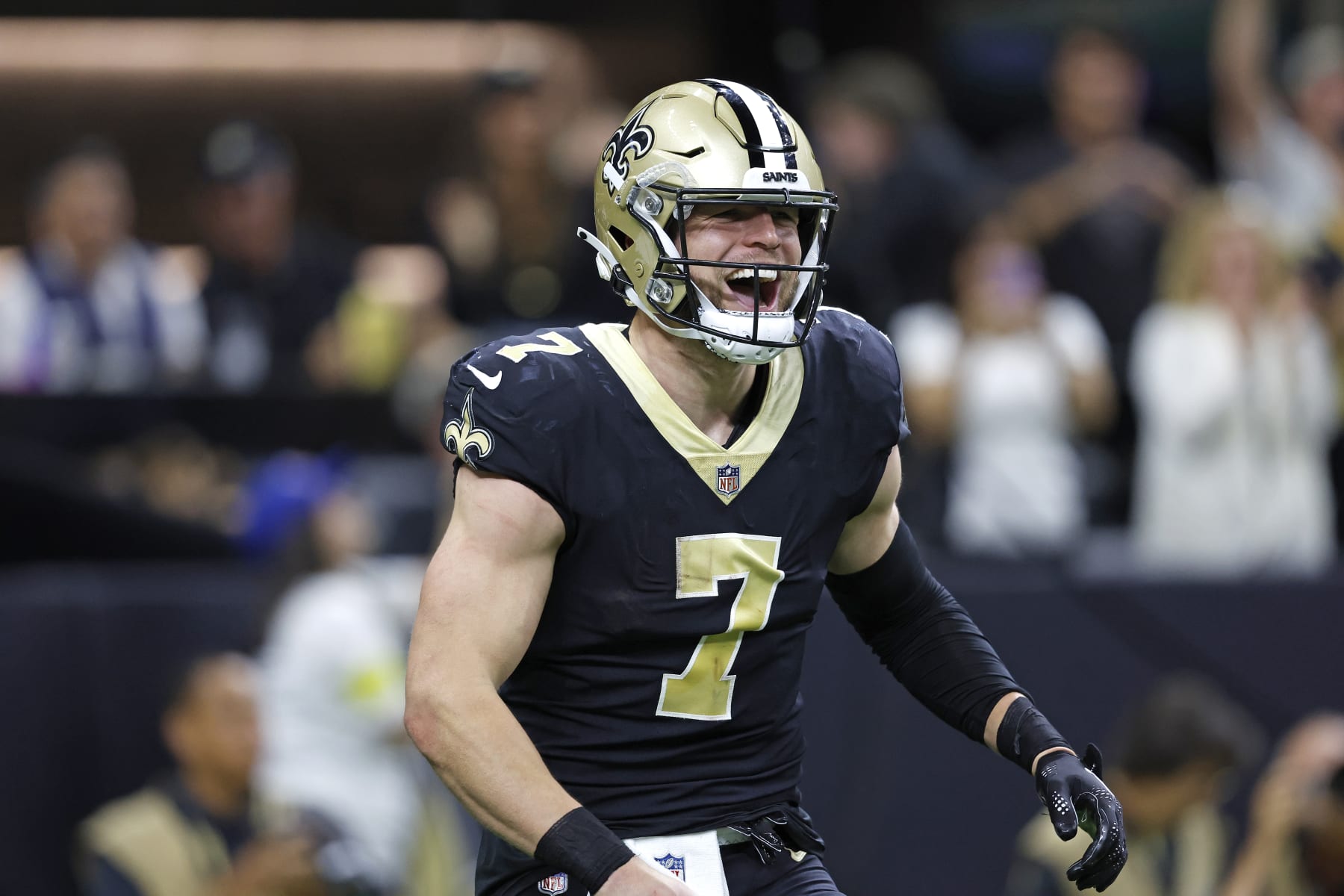 New Orleans Saints tight end Taysom Hill (7) celebrates after throwing a touchdown pass during an NFL football game against the Seattle Seahawks, Sunday, Oct. 9, 2022, in New Orleans. (AP Photo/Tyler Kaufman)