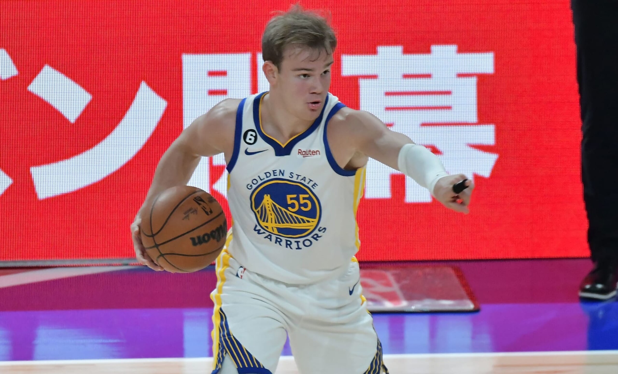 SAITAMA, JAPAN - OCTOBER 02: Mac McClung #55 of the Golden State Warriors handle the ball during the NBA Japan Games between the Washington Wizards and the Golden State Warriors at Saitama Super Arena on October 02, 2022 in Saitama, Japan. NOTE TO USER: User expressly acknowledges and agrees that, by downloading and or using this photograph, User is consenting to the terms and conditions of the Getty Images License Agreement.
 (Photo by Jun Sato/WireImage)