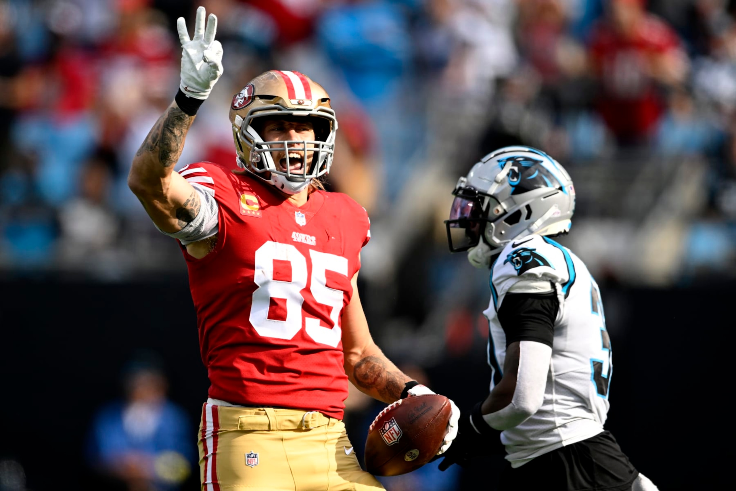 CHARLOTTE, NORTH CAROLINA - OCTOBER 09: George Kittle #85 of the San Francisco 49ers celebrates a play during the first half in the game against the Carolina Panthers at Bank of America Stadium on October 09, 2022 in Charlotte, North Carolina. (Photo by Eakin Howard/Getty Images)