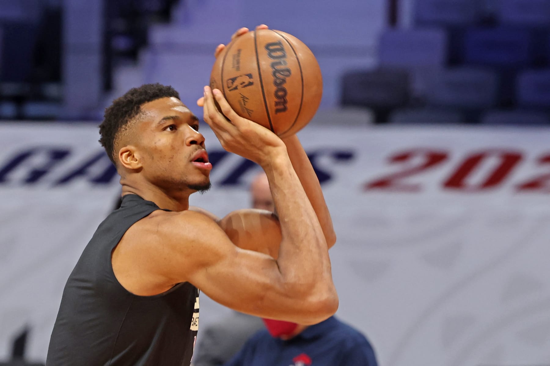 Milwaukee Bucks' forward Giannis Antetokounmpo (L) takes part in a training session ahead of the NBA pre-season basketball match between Milwaukee Bucks and Atlanta Hawks at Etihad Arena on Yas Island in Abu Dhabi, on October 5, 2022. (Photo by Giuseppe CACACE / AFP) / The erroneous mention[s] appearing in the metadata of this photo by Giuseppe CACACE has been modified in AFP systems in the following manner: [Giannis Antetokounmpo] instead of [Thanasis Antetokounmpo]. Please immediately remove the erroneous mention[s] from all your online services and delete it (them) from your servers. If you have been authorized by AFP to distribute it (them) to third parties, please ensure that the same actions are carried out by them. Failure to promptly comply with these instructions will entail liability on your part for any continued or post notification usage. Therefore we thank you very much for all your attention and prompt action. We are sorry for the inconvenience this notification may cause and remain at your disposal for any further information you may require. (Photo by GIUSEPPE CACACE/AFP via Getty Images)