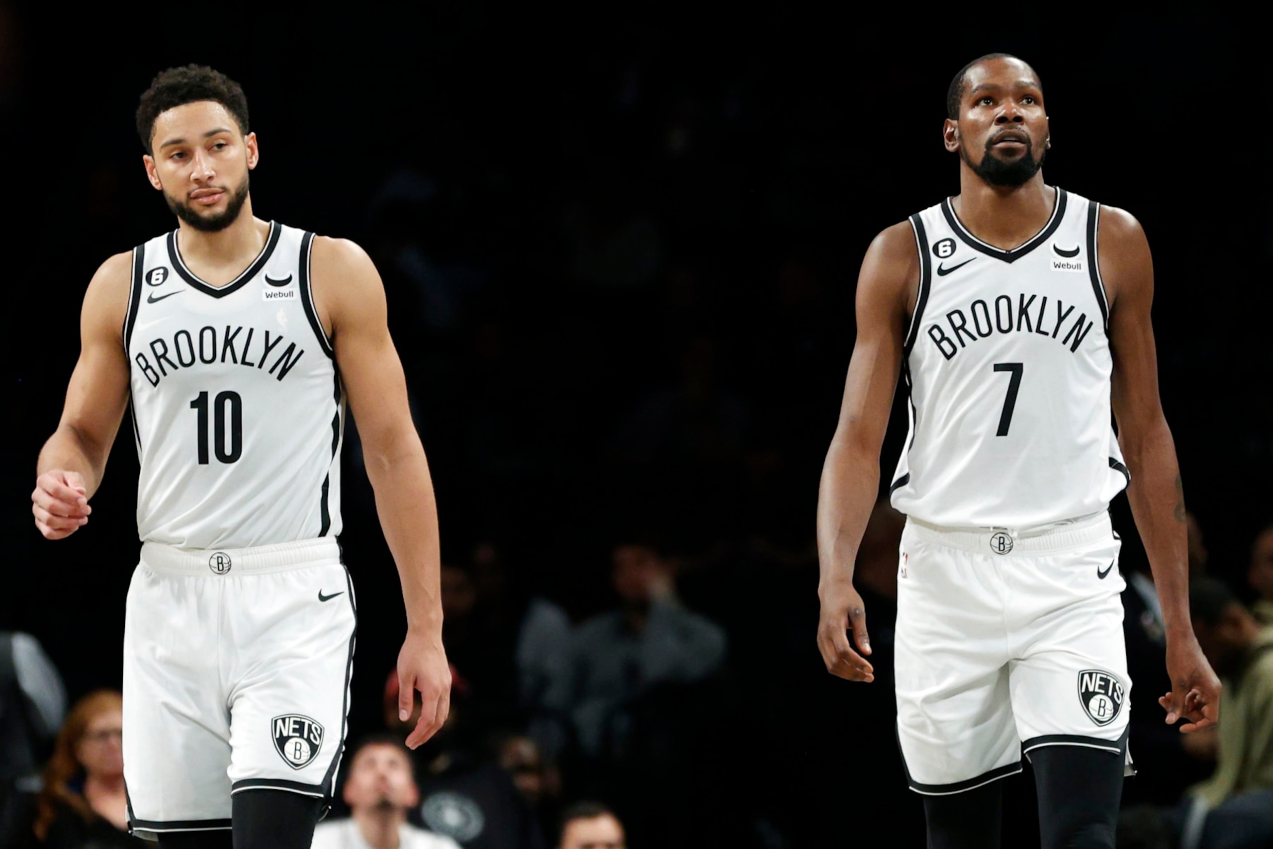 NEW YORK, NEW YORK - OCTOBER 06: Ben Simmons #10 and Kevin Durant #7 of the Brooklyn Nets look on during the second half against the Miami Heat at Barclays Center on October 06, 2022 in the Brooklyn borough of New York City. NOTE TO USER: User expressly acknowledges and agrees that, by downloading and or using this photograph, User is consenting to the terms and conditions of the Getty Images License Agreement. (Photo by Sarah Stier/Getty Images) NEW YORK, NEW YORK - OCTOBER 06: Ben Simmons #10 and Kevin Durant #7 of the Brooklyn Nets look on during the second half against the Miami Heat at Barclays Center on October 06, 2022 in the Brooklyn borough of New York City. NOTE TO USER: User expressly acknowledges and agrees that, by downloading and or using this photograph, User is consenting to the terms and conditions of the Getty Images License Agreement. (Photo by Sarah Stier/Getty Images)